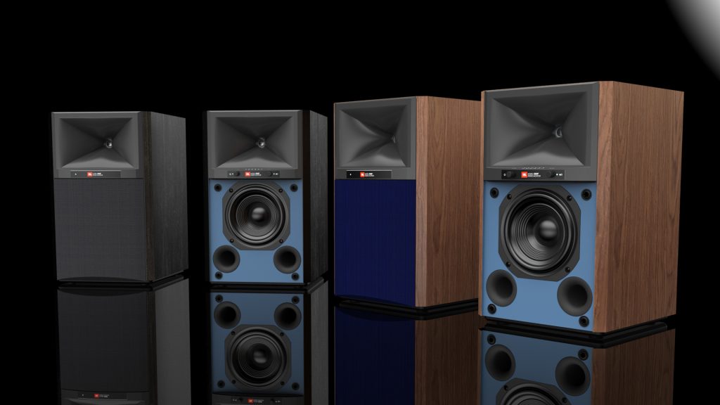 The JBL 4305P speakers lined up against a black background.