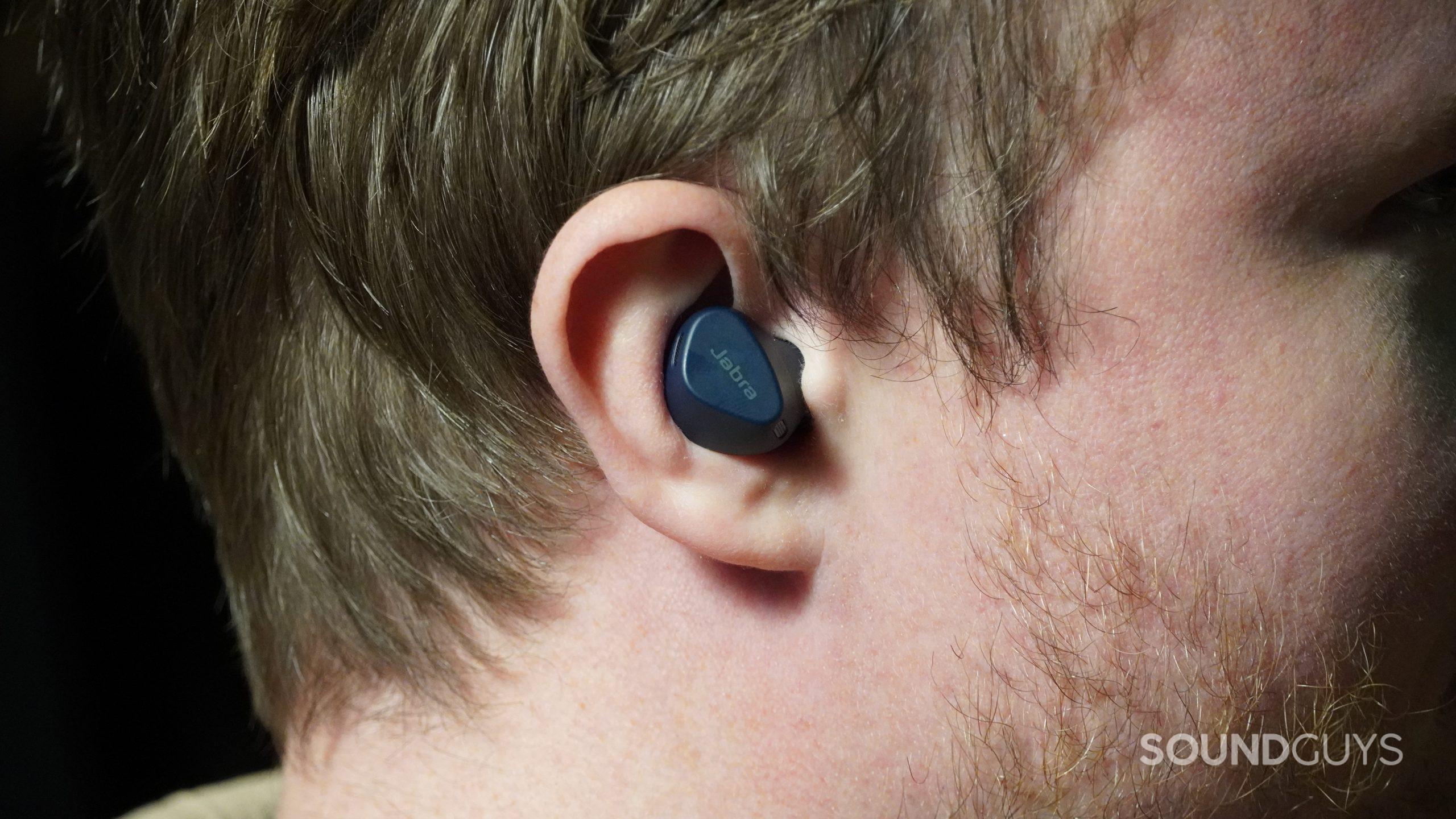 Jabra Elite 4 Active side profile in a persons ear.