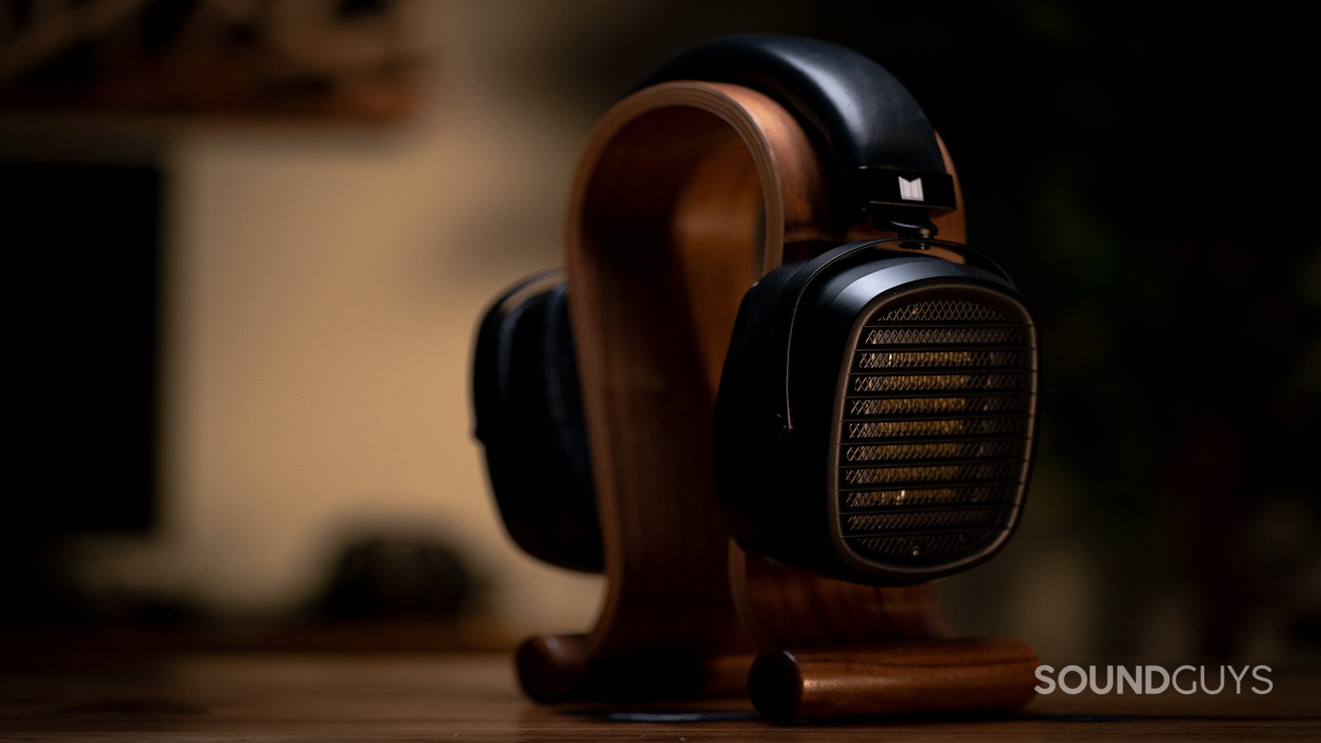 The Monolith by Monoprice AMT headphones on an Omega stand.