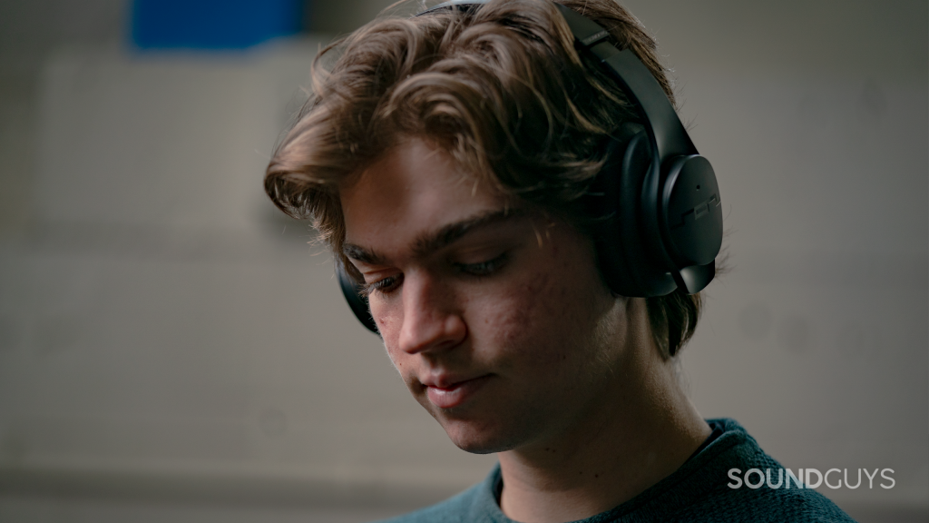 Sol Republic Soundtrack Pro shown on mans head listening to music.