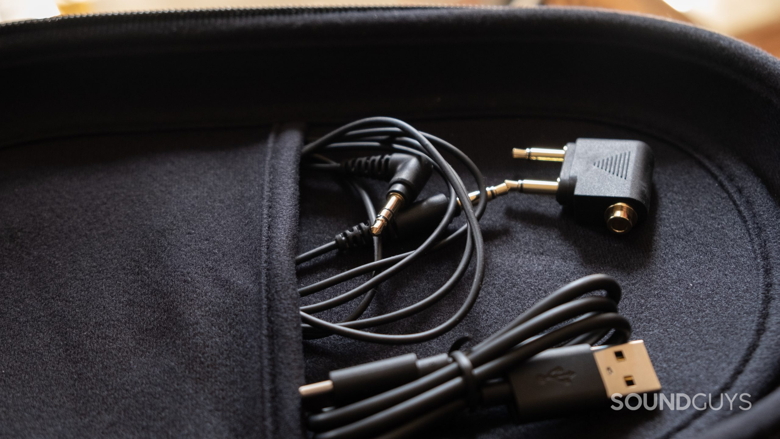 In the included case the Yamaha YH-E700A fit the 3.5mm cable, USB-C cable, and airplane adapter.