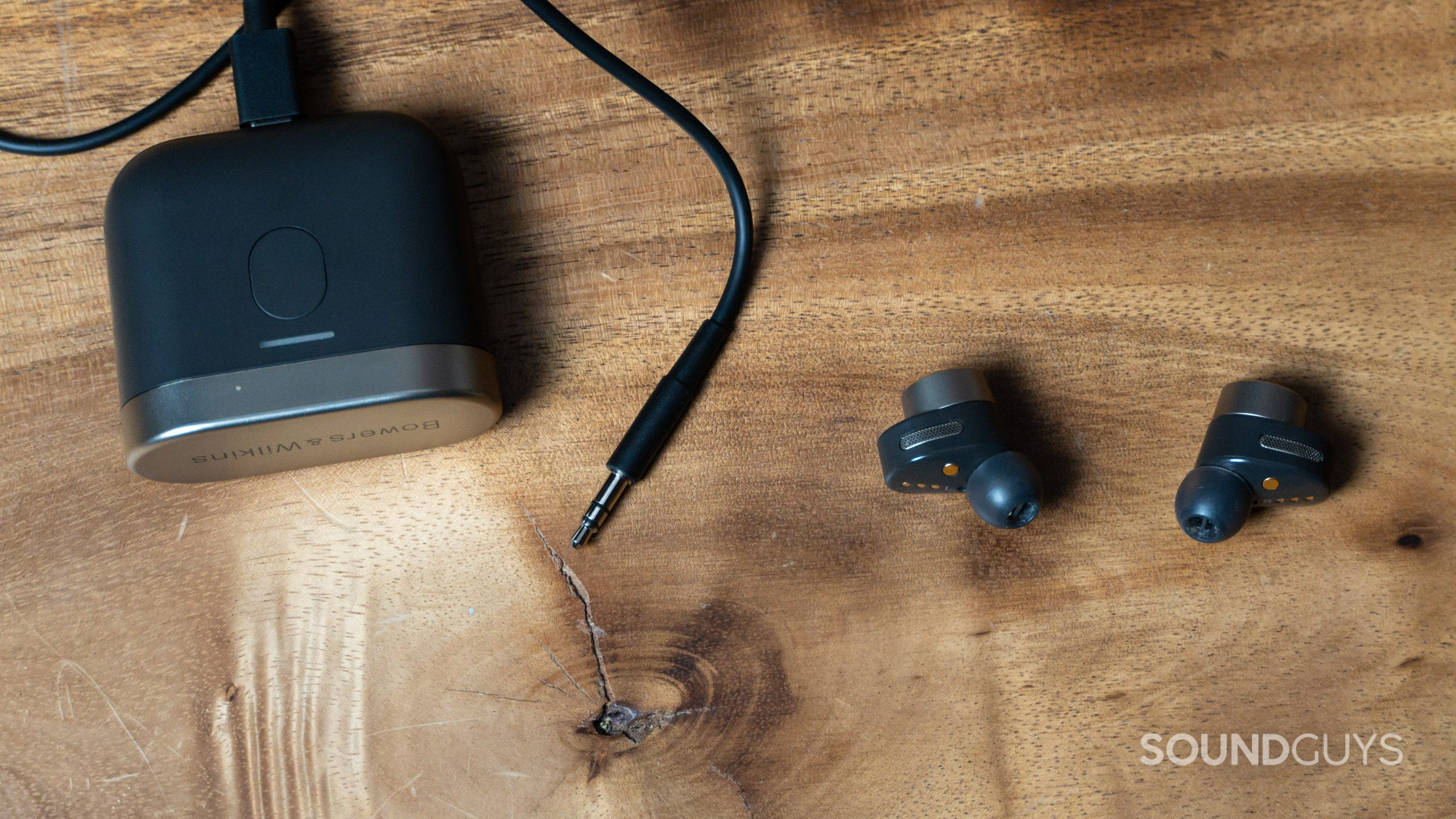 Bowers and Wilkins PI7 connected to 3.5mm audio jack.