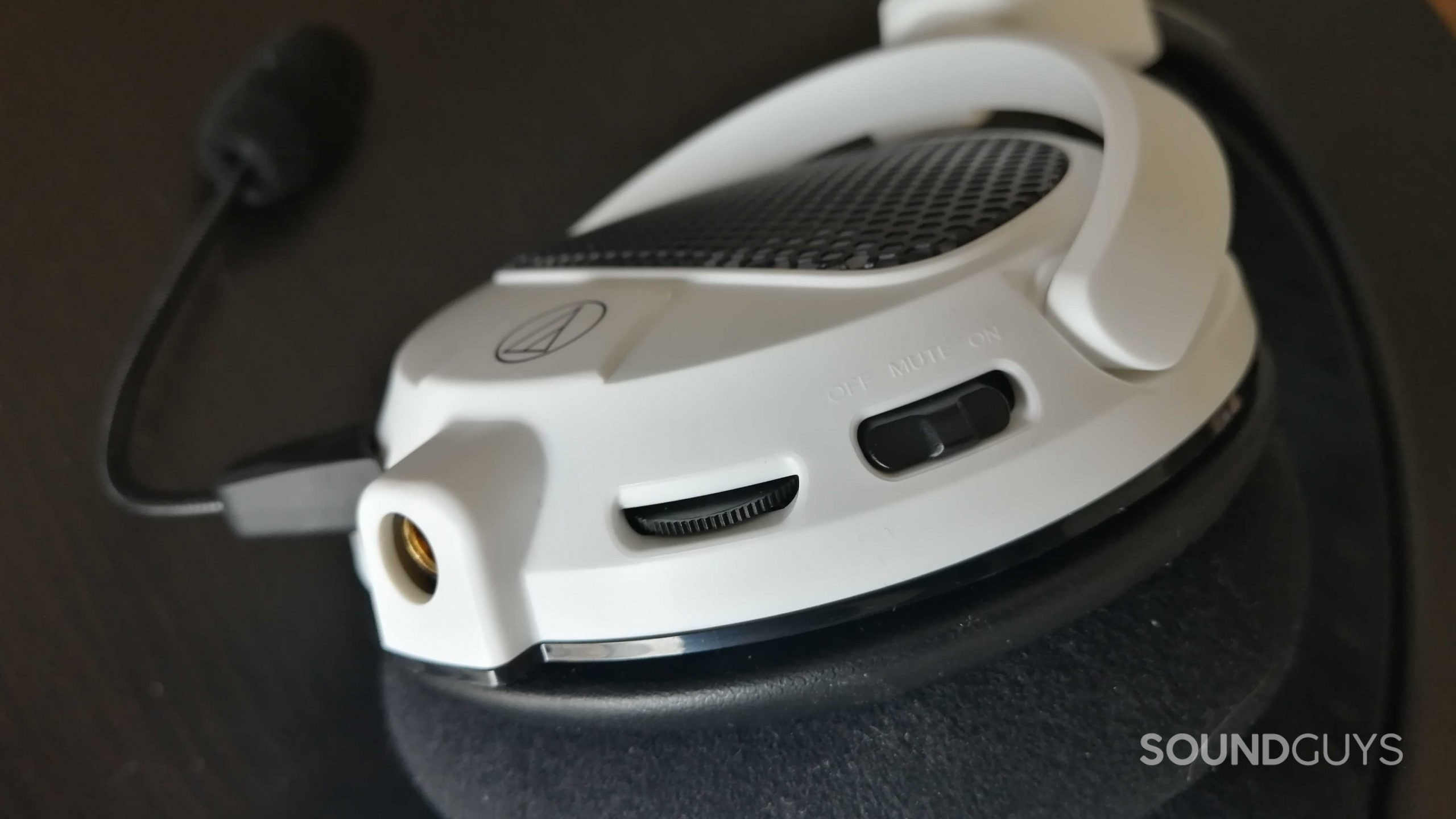 A closeup view of the volume controls and mute button on the Audio-Technia ATH-GDL3 headset