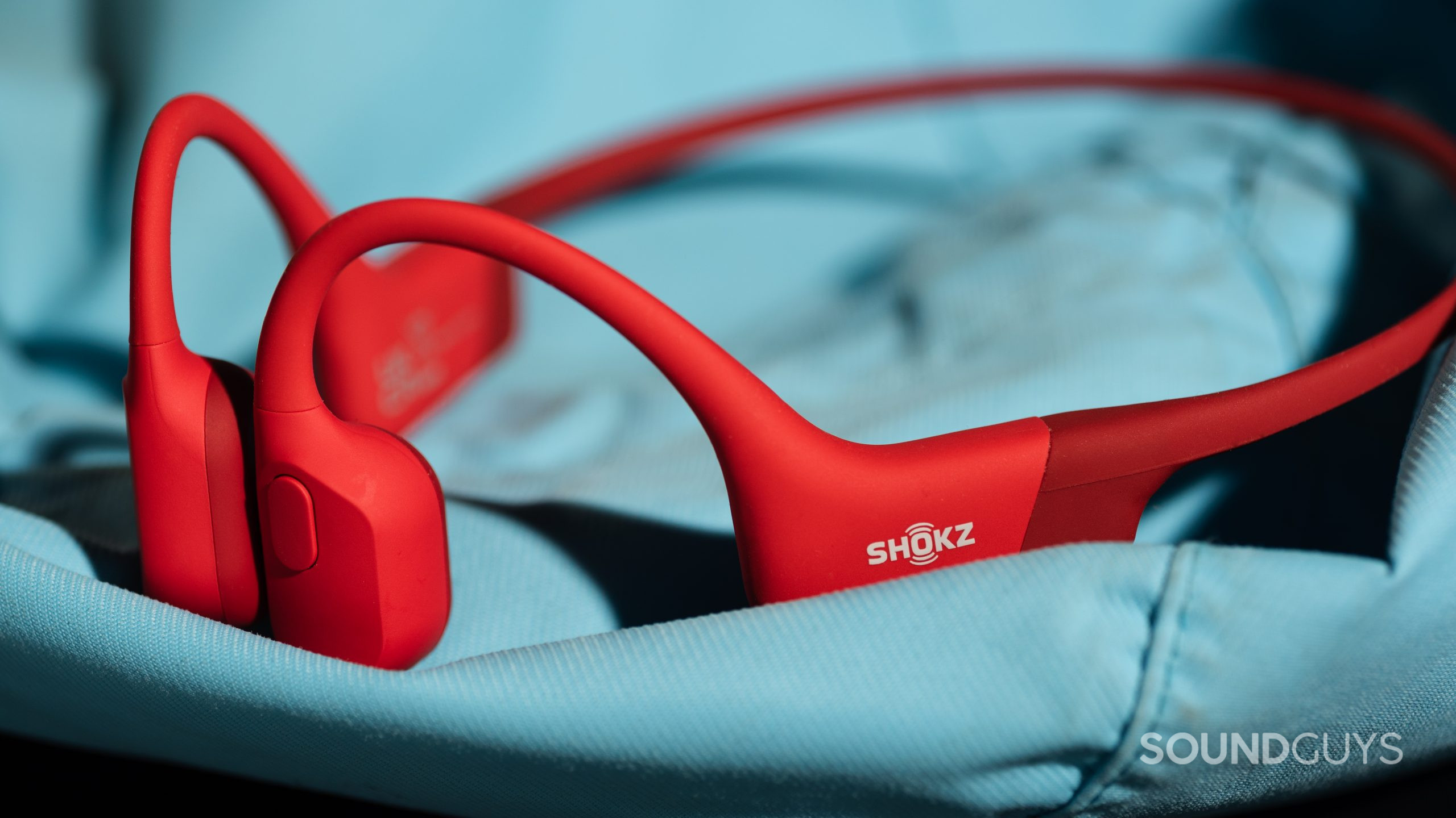 The Shokz OpenRun bone conduction headphones' multi-function button.