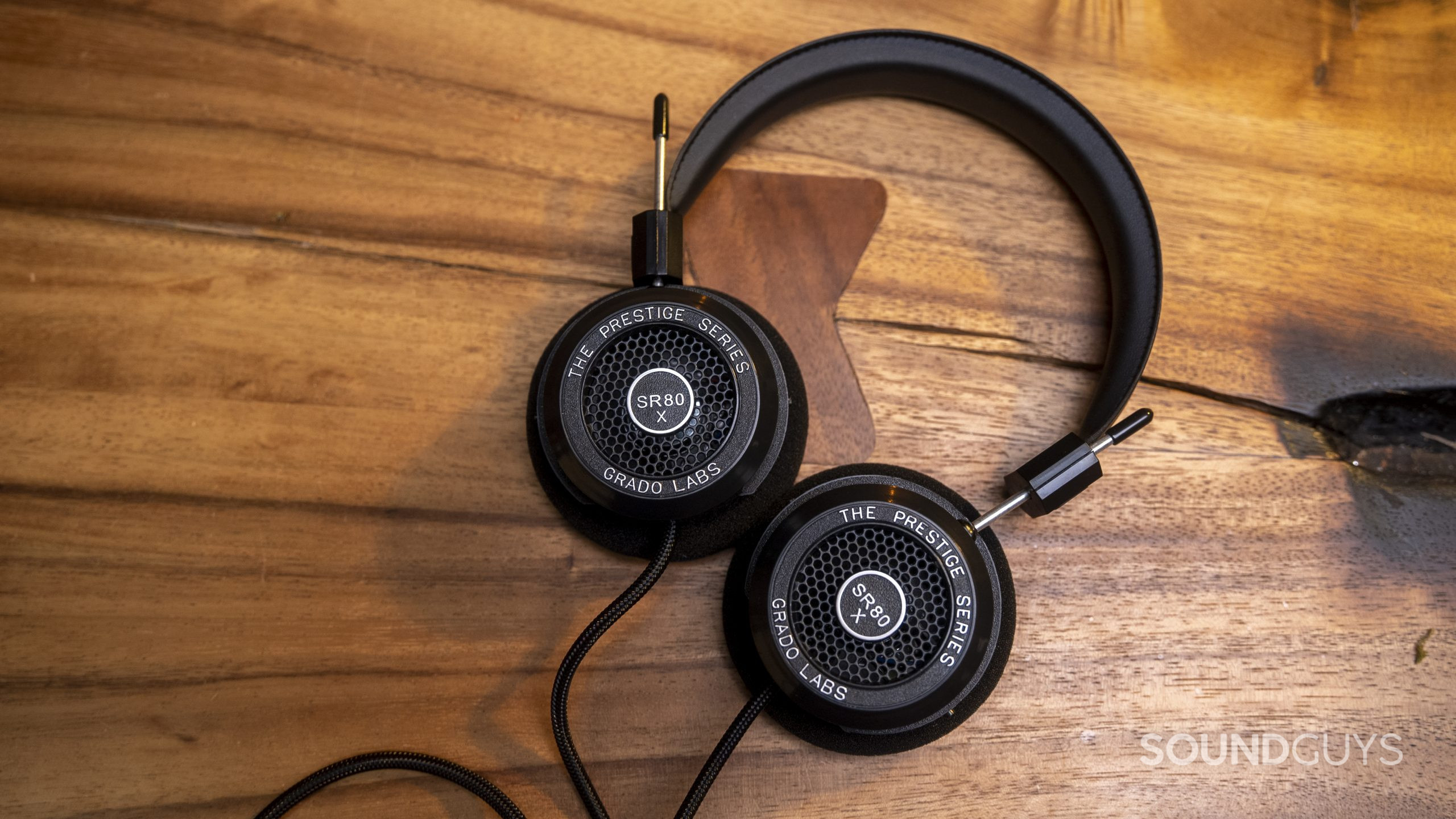 The Grado Labs SR80x flat lay on a wooden table.
