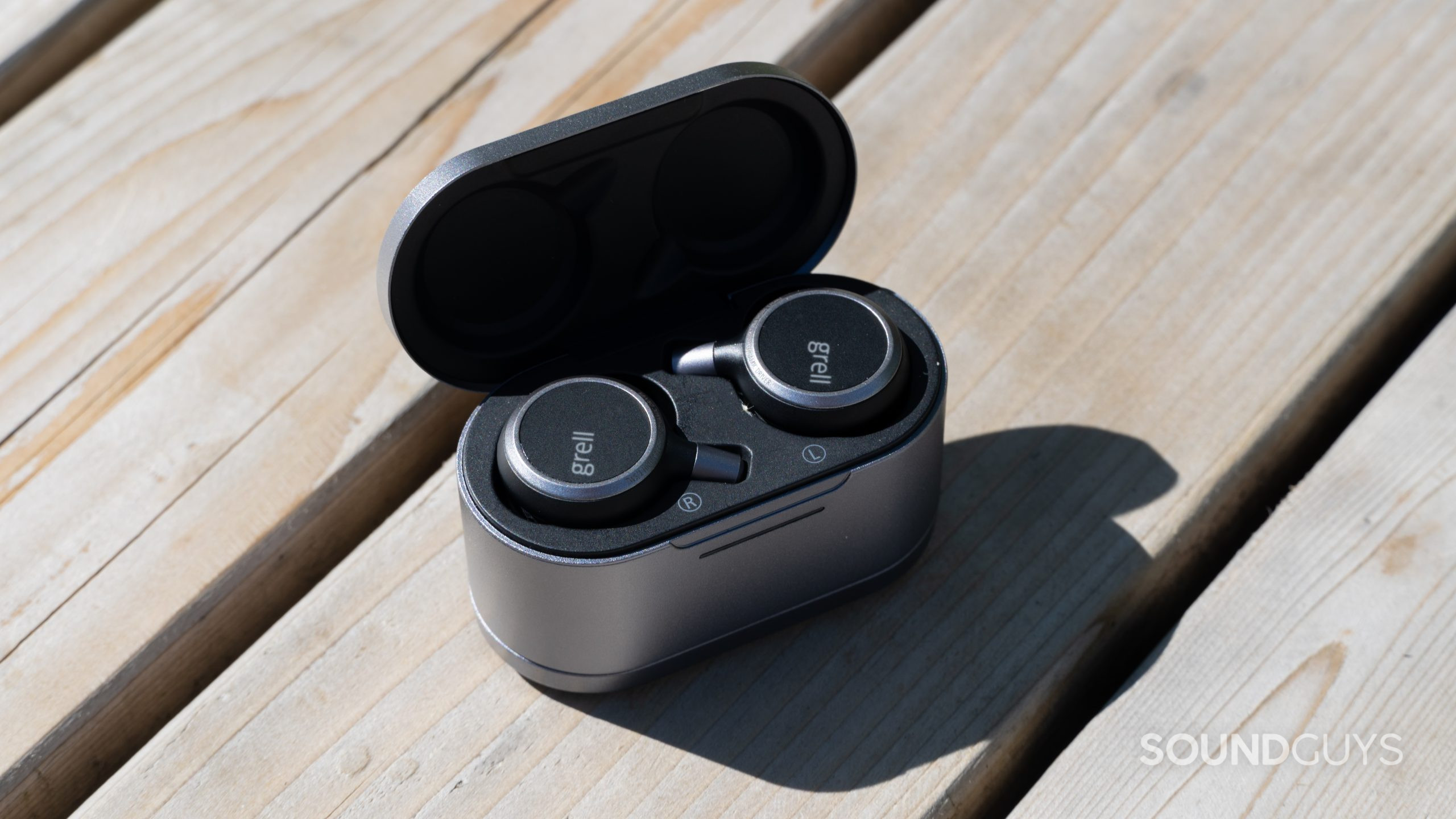 Grell Audio TWS 1 earbuds in case outside
