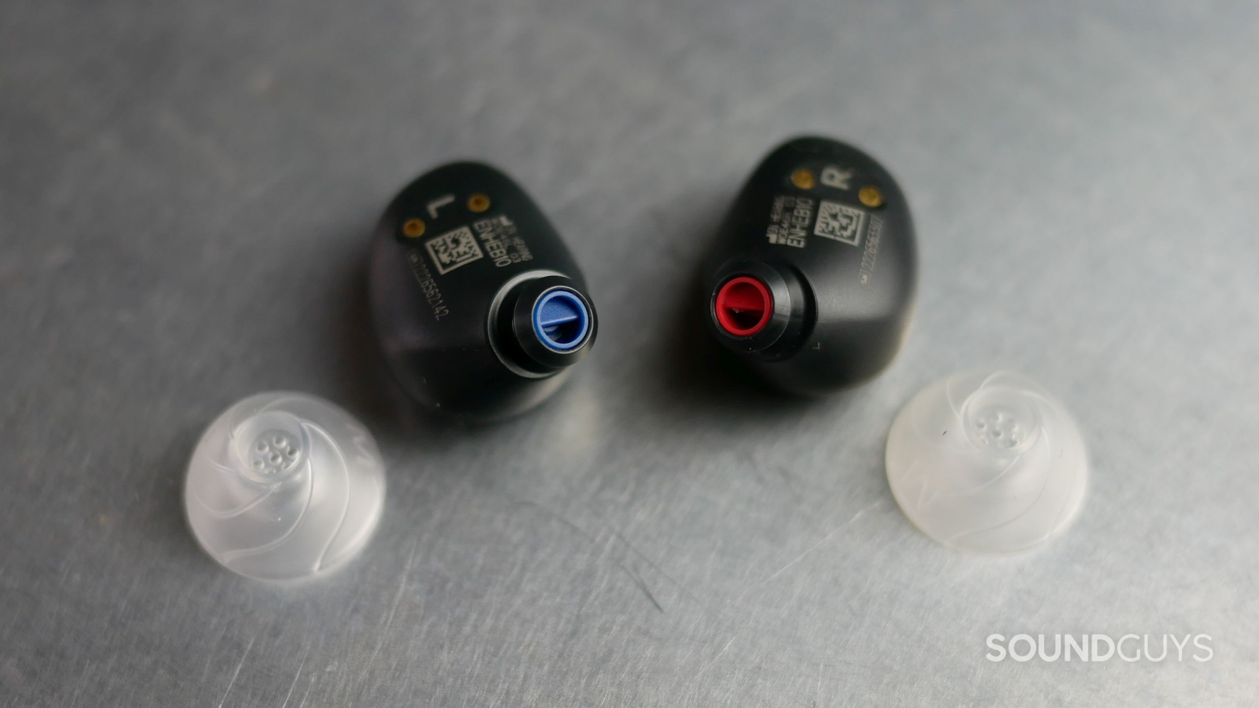 Jabra Enhance Plus earbuds with silicone tips removed to highlight left/right blue/red color coding.