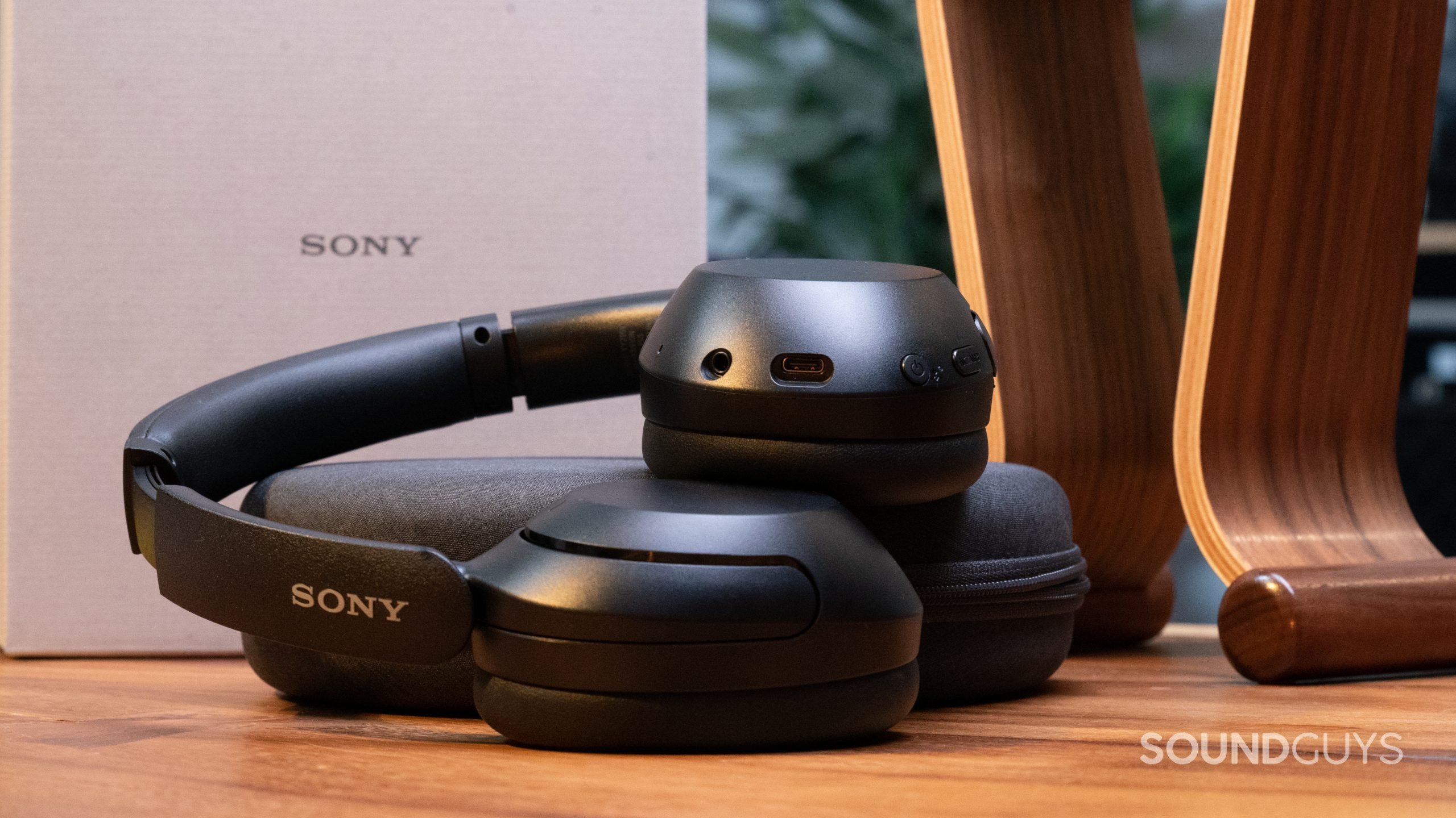 Shot from the side to show the Sony WH-XB910N controls on the left ear cup.