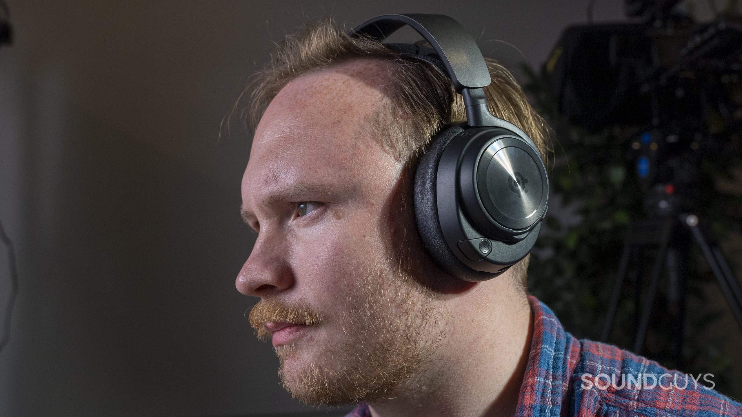 The SteelSeries Arctis Nova Pro Wireless being worn by a person.