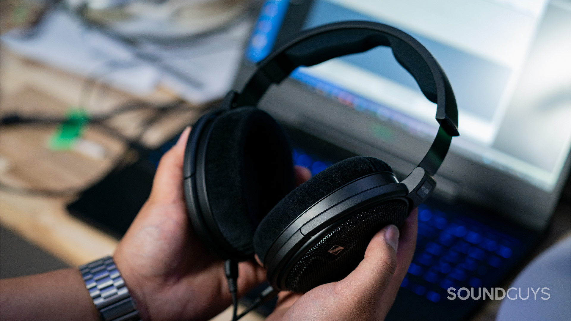 Sennheiser HD 660S hands hold full Sennheiser HD660S shown held in hands.