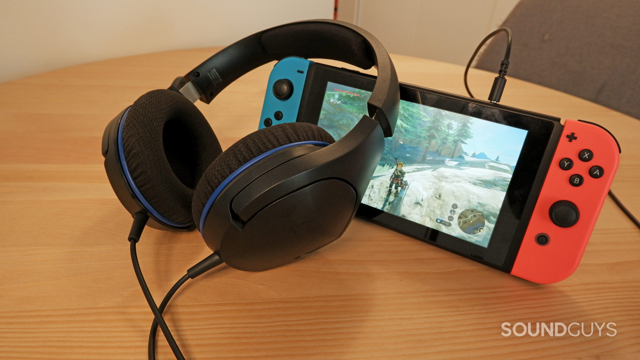 The HyperX Cloud Stinger Core resting against a Nintendo Switch.