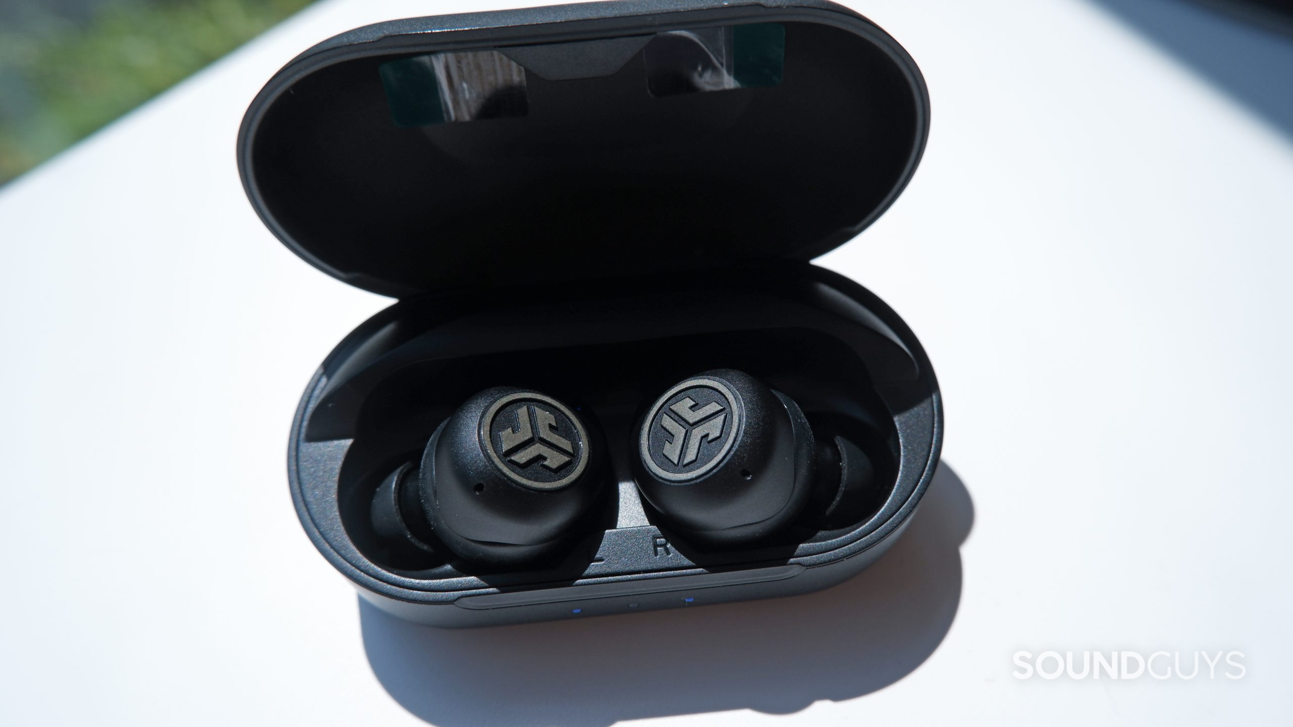 The JLab JBuds Air Pro inside the open case.