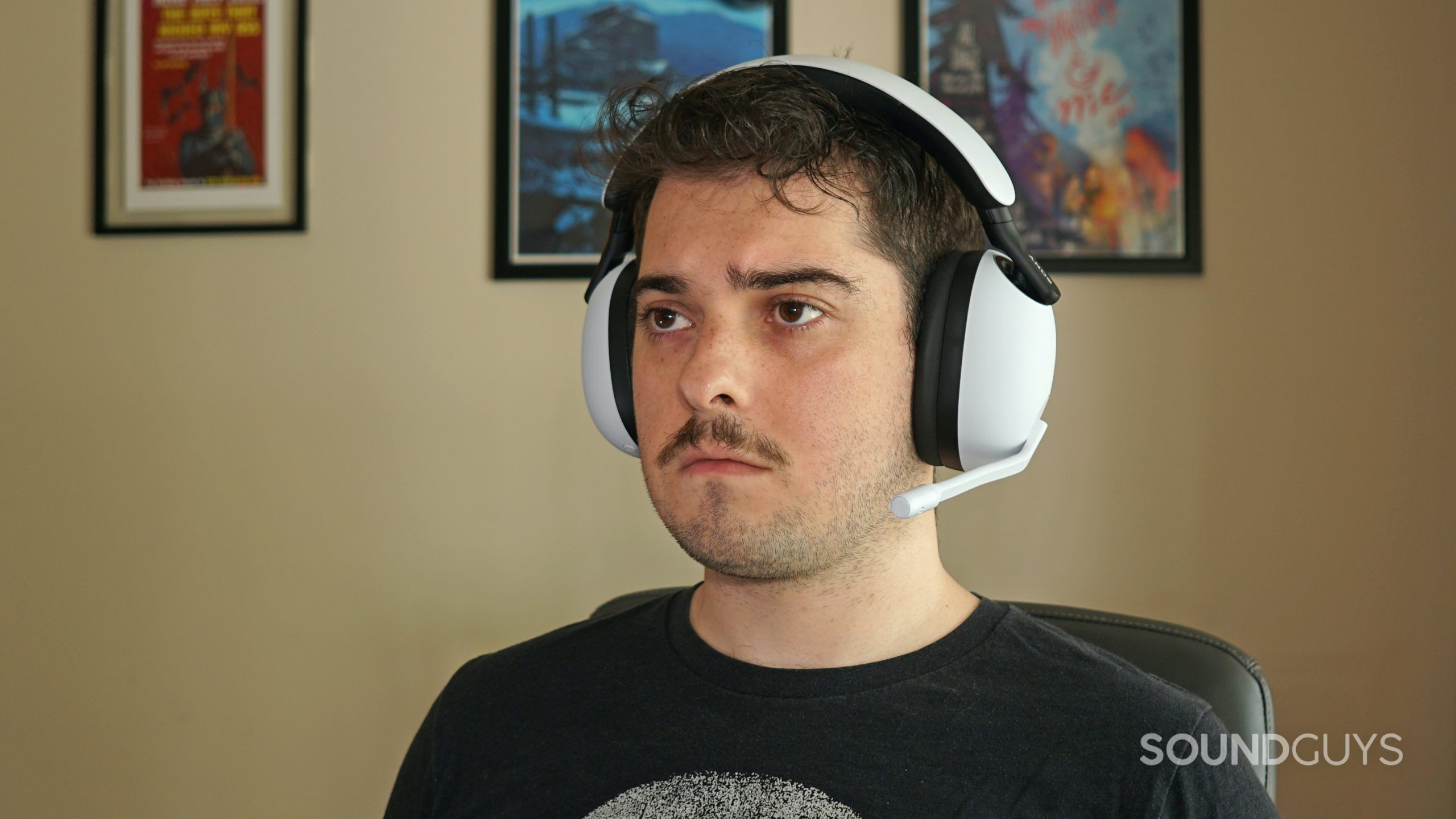 A man wears the Sony INZONE H9 gaming headset