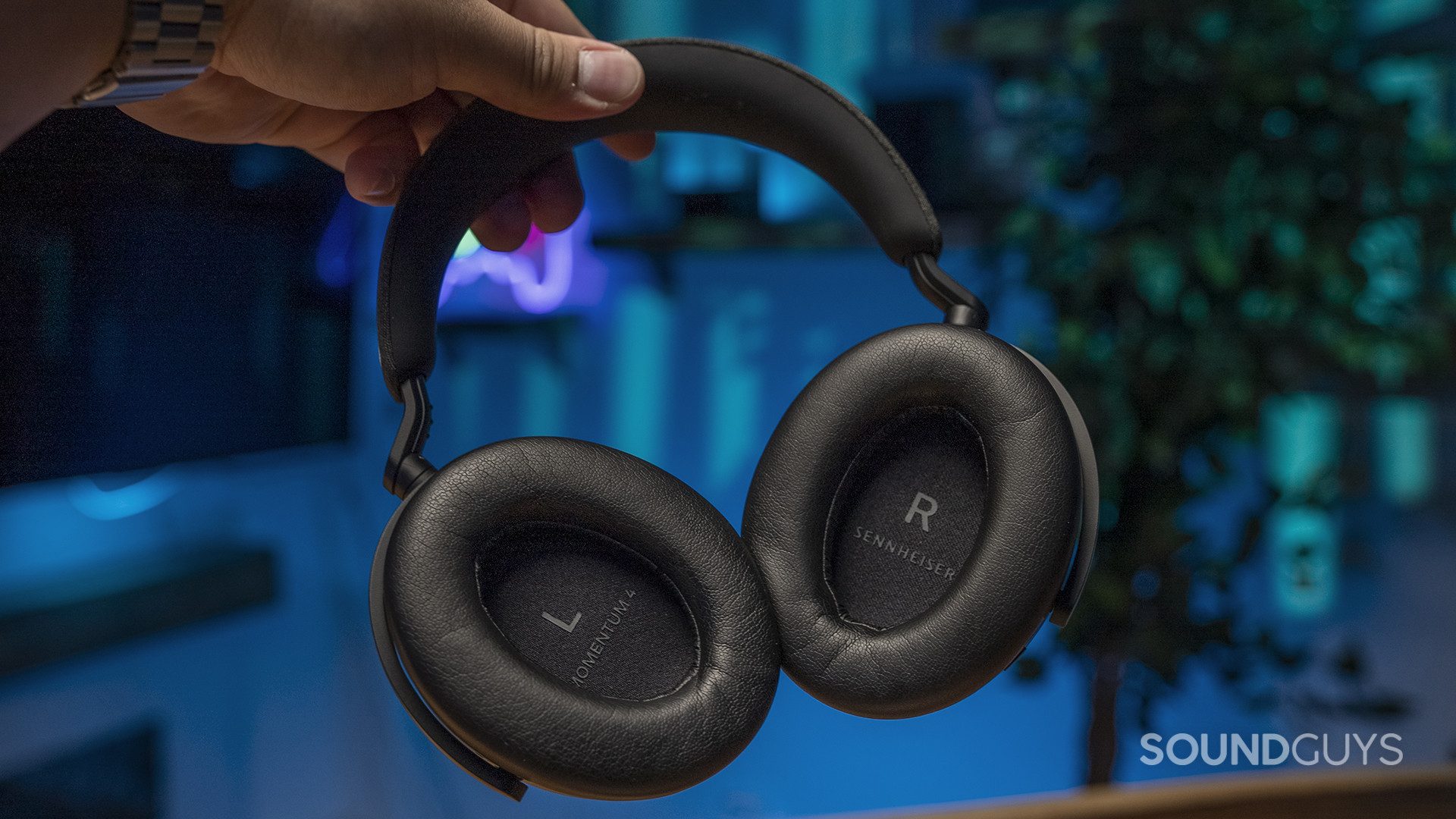 Thick pads dress the ear cups and band of the Sennheiser Momentum 4 Wireless.
