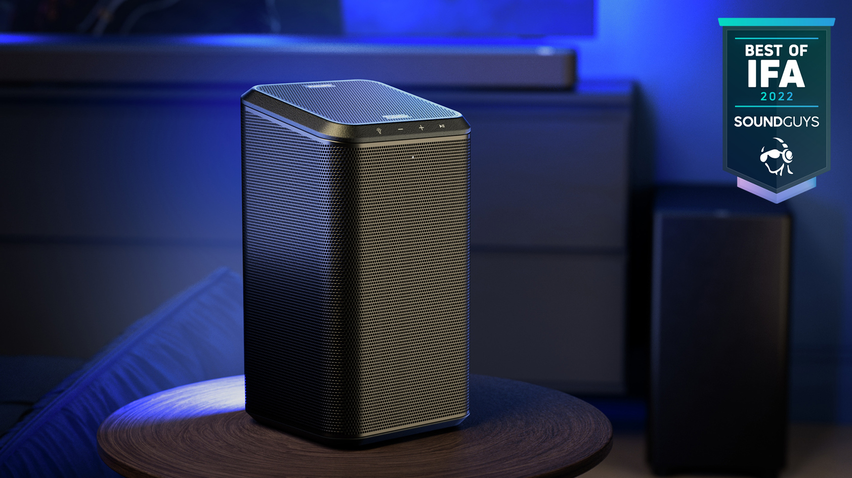Philips FS1 Bluetooth speaker IFA badge The Philips FS! Bluetooth speaker turned to a three-quarters view with a blue background.