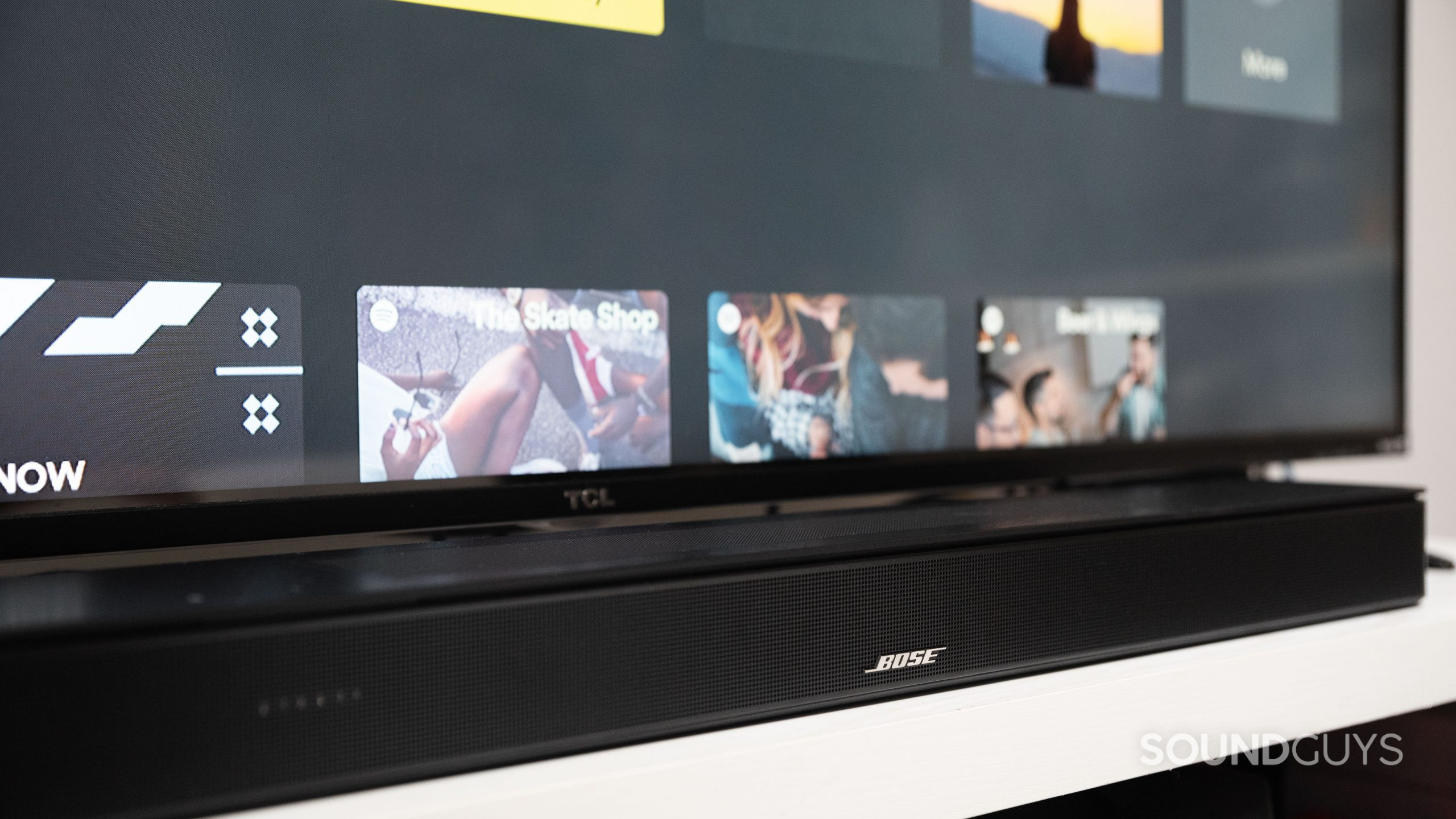 The Bose Smart Soundbar 600 on a TV stand.