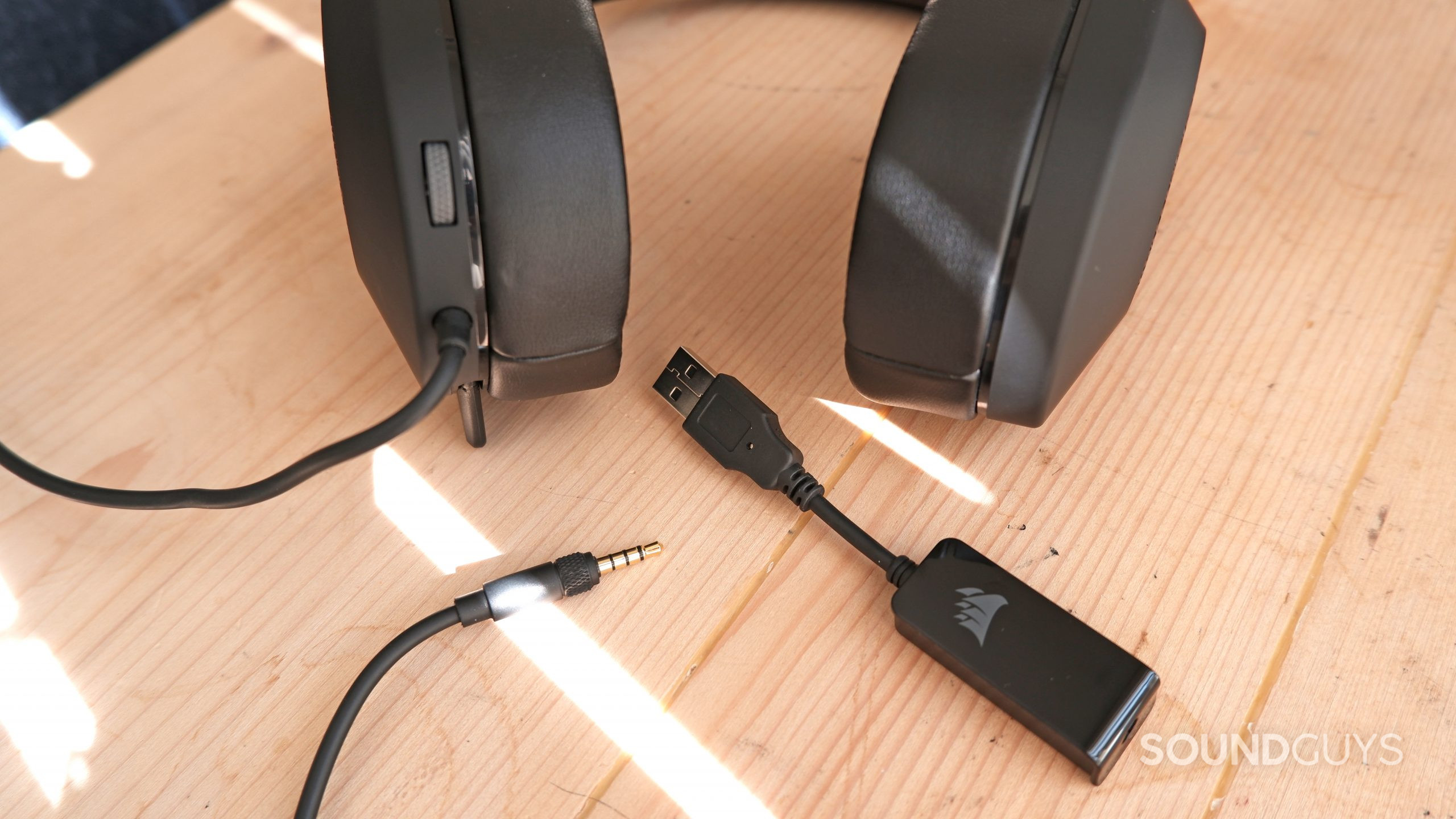 The 3.5mm TRRS cable and USB-A adapter for the Corsair HS65 Surround.