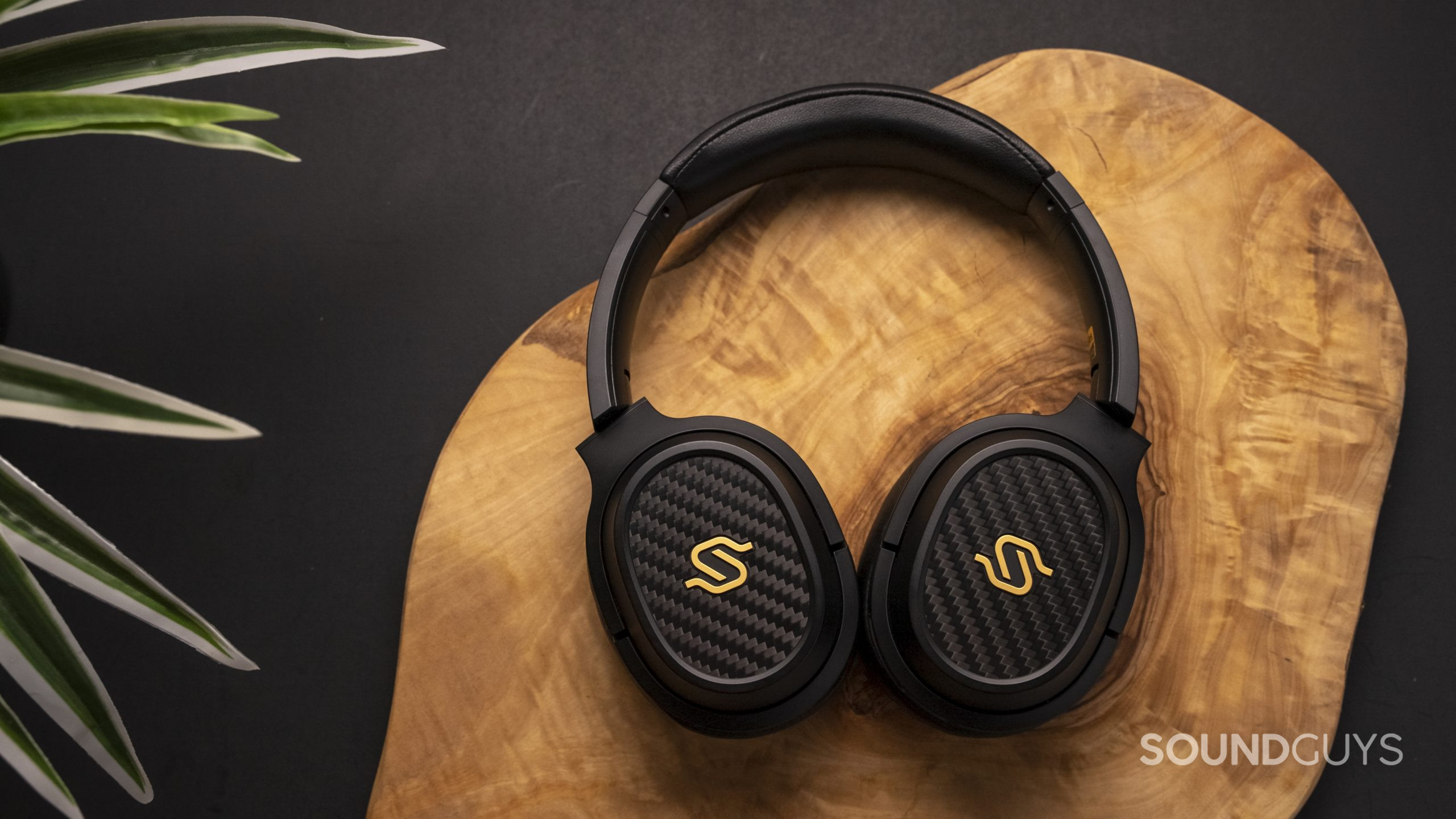 Edifier Stax Spirit S3- Headphones lay flat on wooden surface.