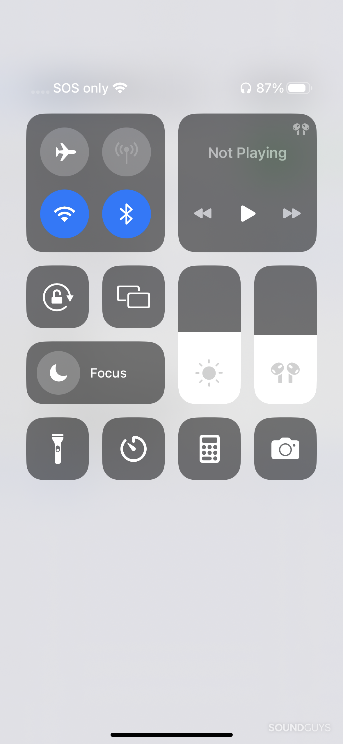 The control center on iOS, showing AirPods connected to the phone.