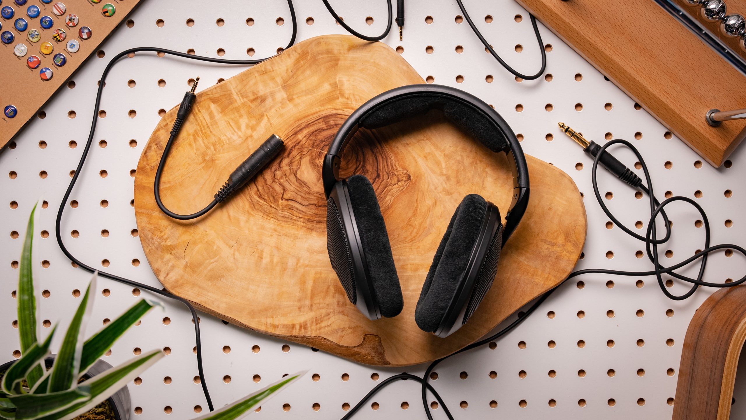 Sennheiser HD650s headphones on a wooden slab