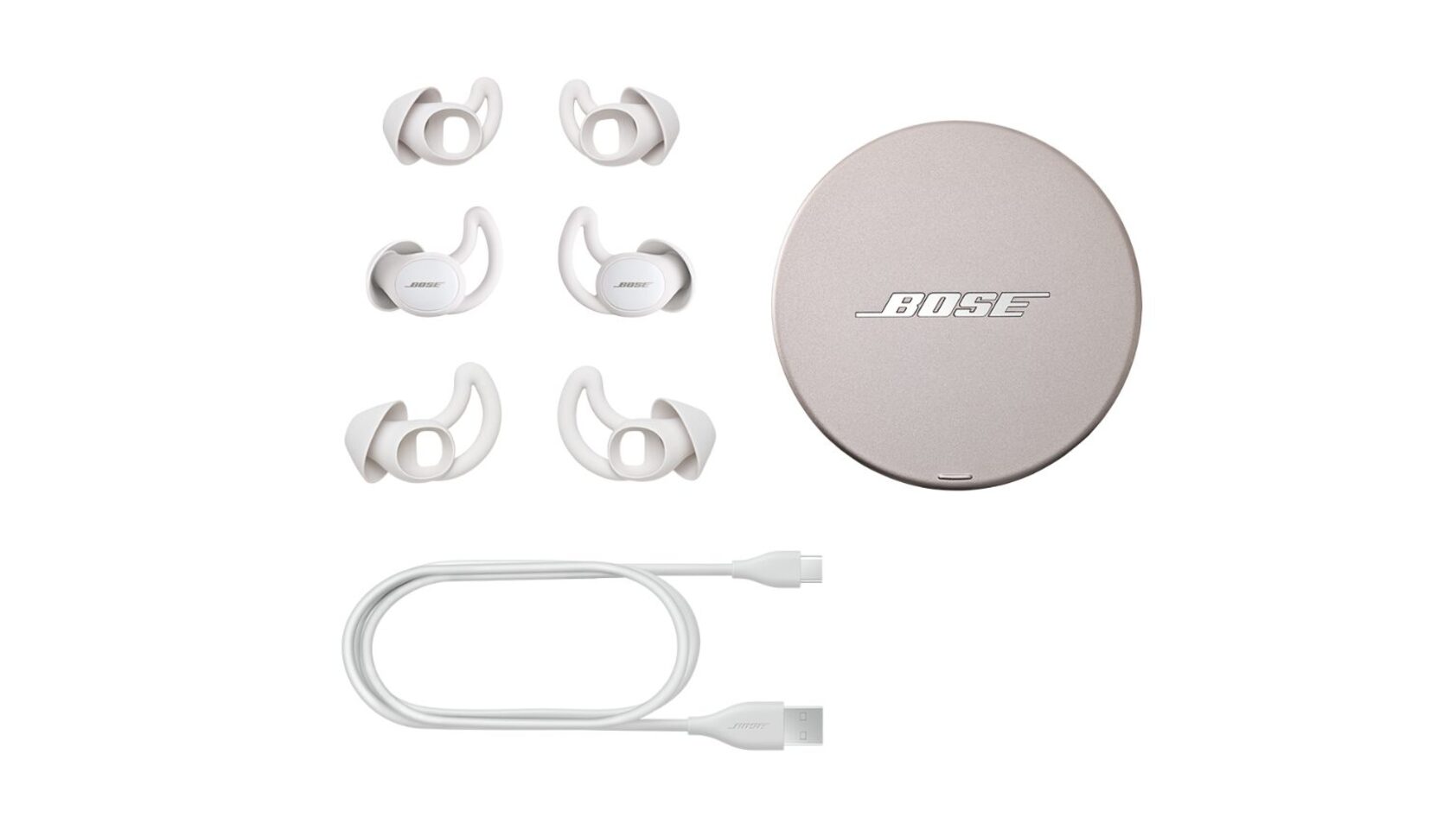 The Bose Sleepbuds accessories, including ear tips, cable, and case.