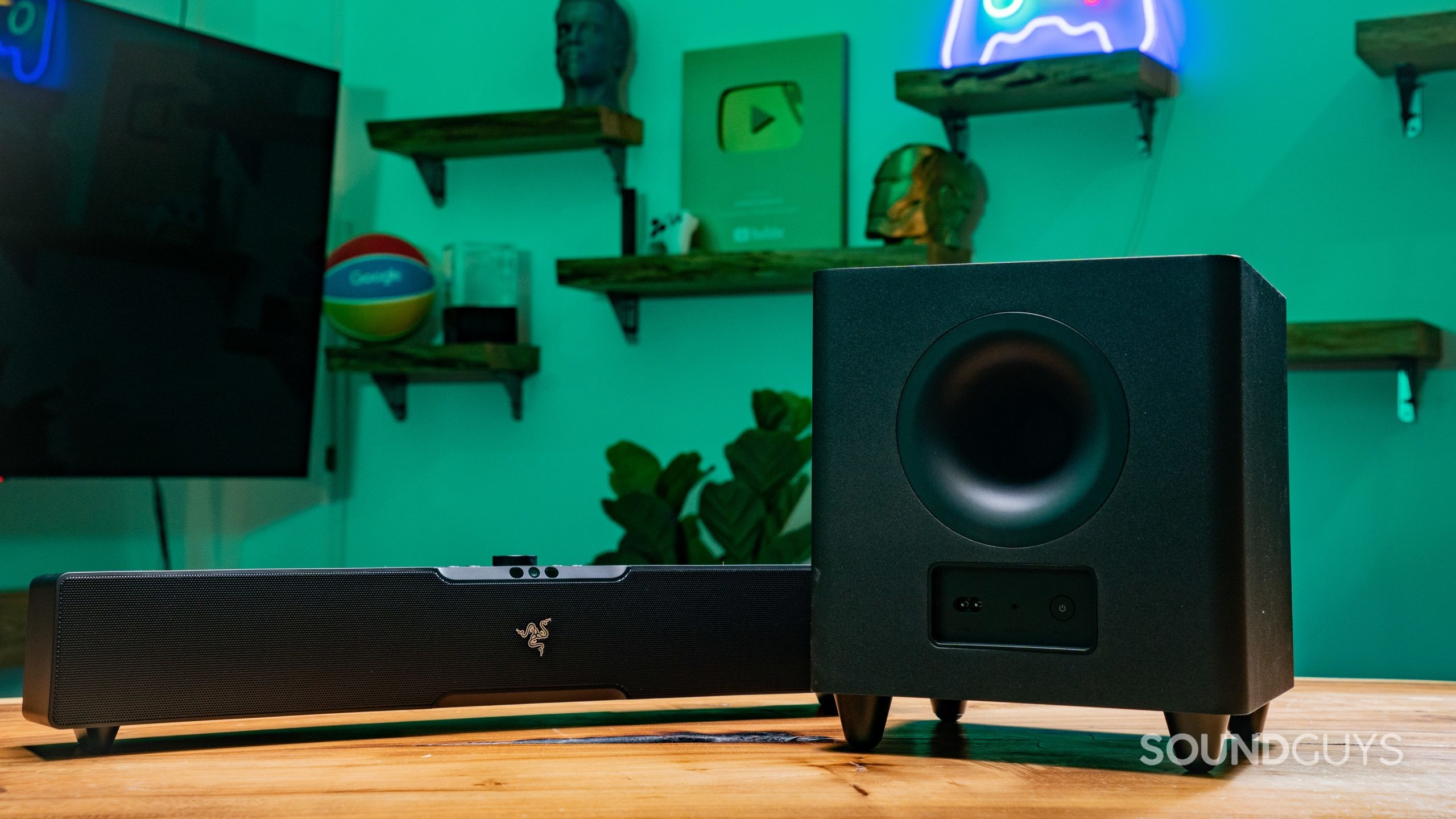 Image of a Razer Leviathon V2 Pro soundbar on a desk