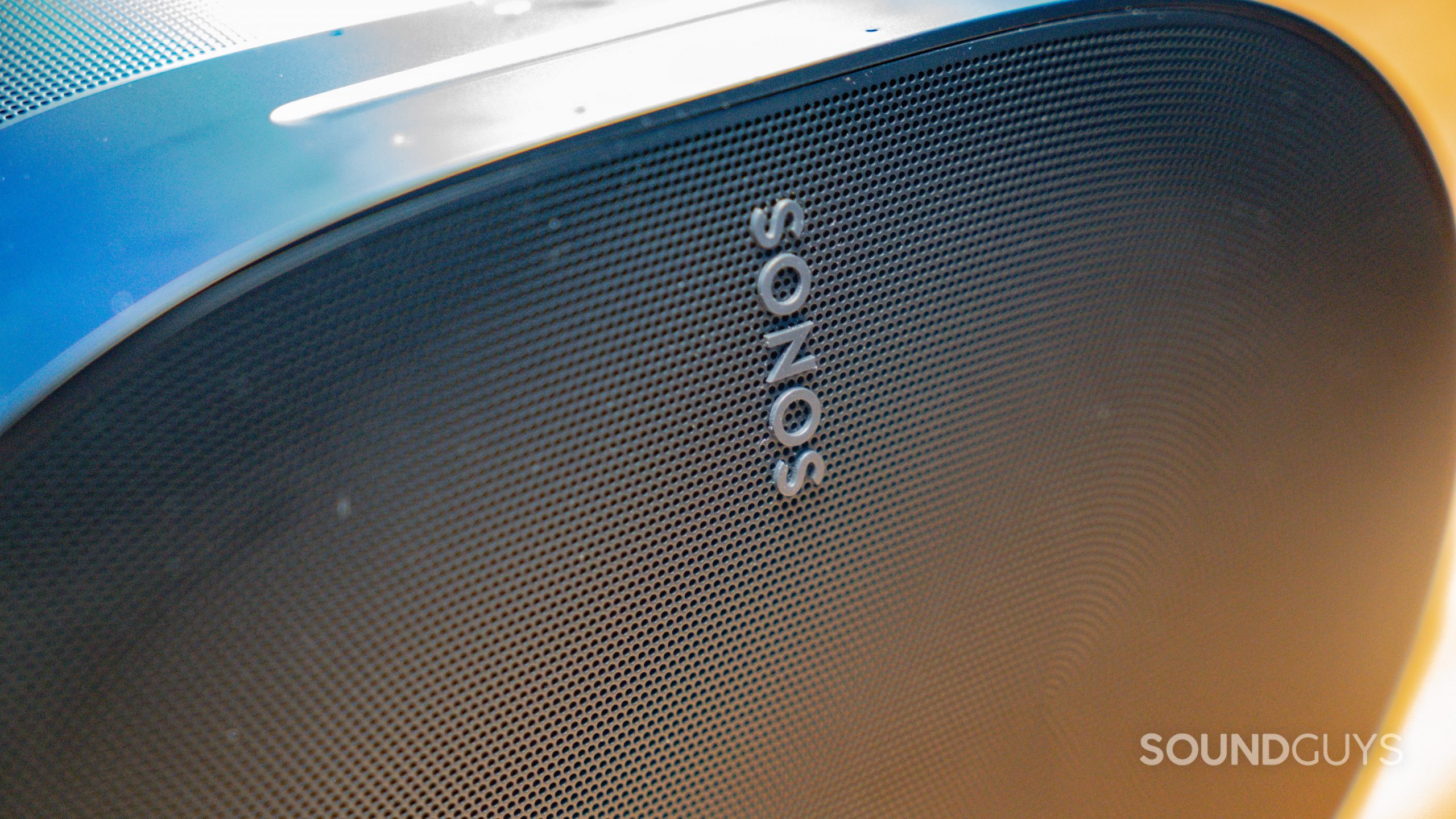 Sonos Era 300 zoomed in on the Sonos logo and front speaker grille.