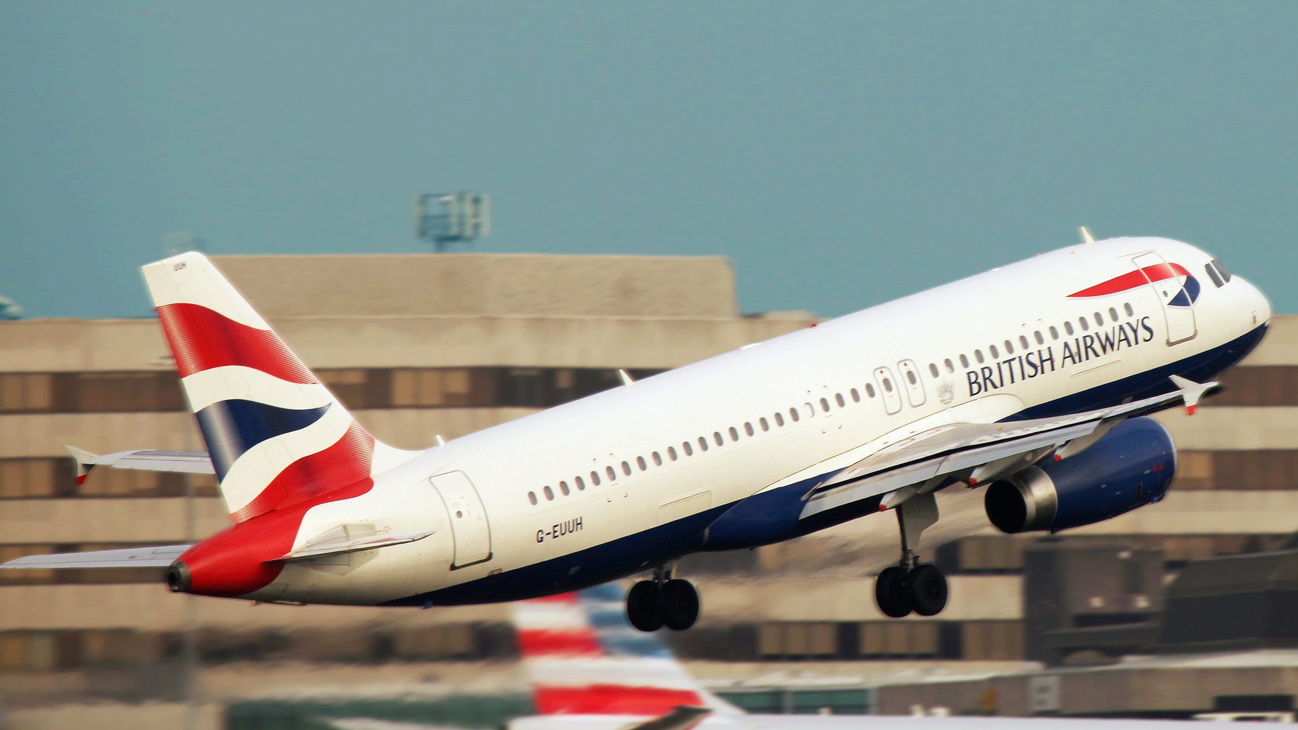 A photo of a British Airways airplane taking off.