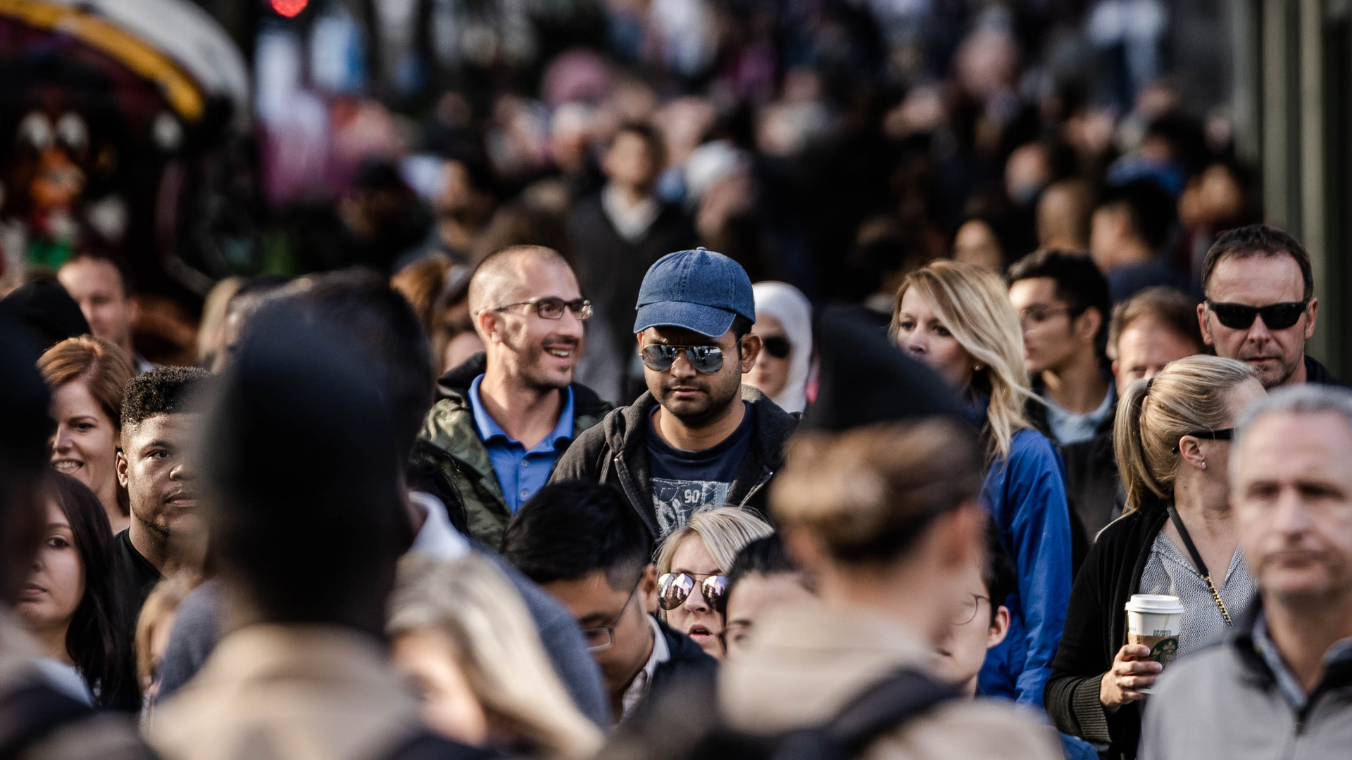 A photo of many people in a crowd.