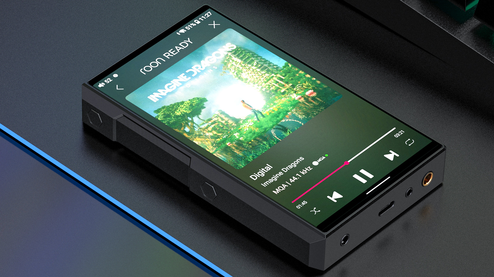 Image of a FiiO M11S Hi-Res Portable Music Player on a black desk