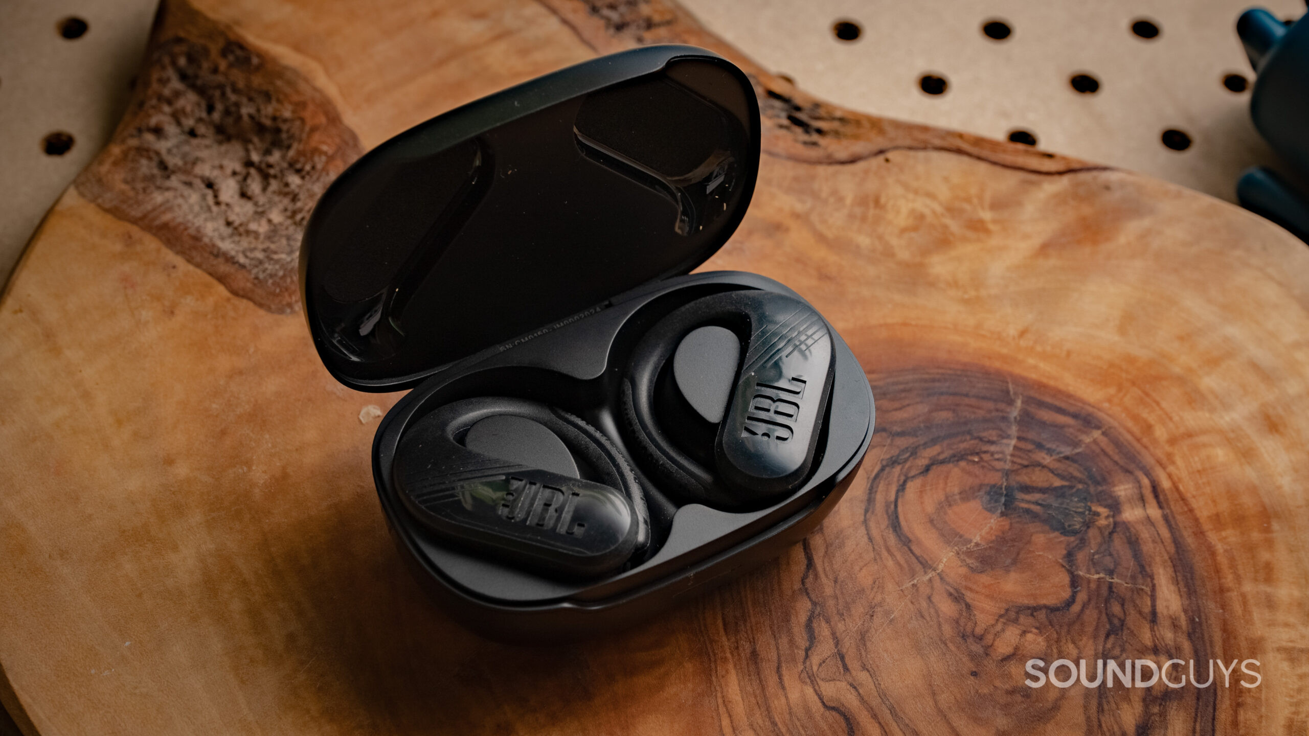 JBL Endurance Peak 3 earbuds in charging case