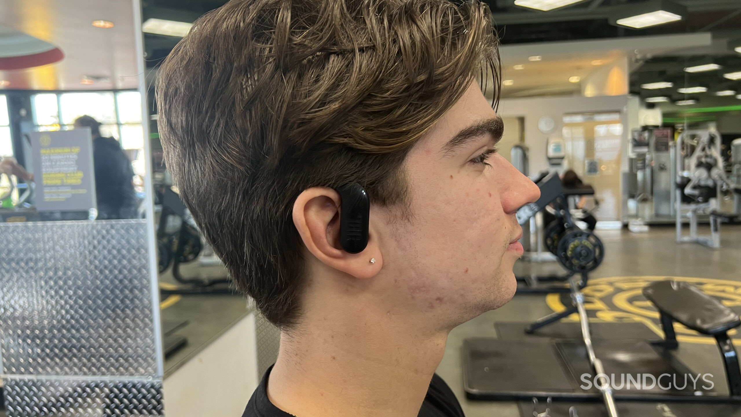 JBL Endurance Peak 3 in someones ear at the gym