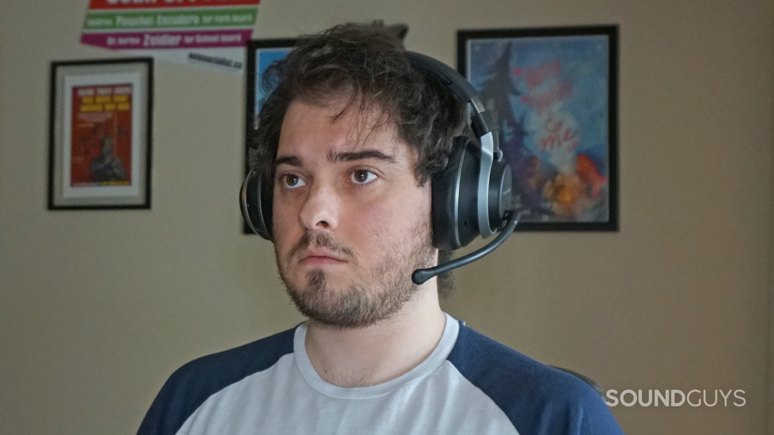 A man wears the Turtle Beach Stealth Pro headset.