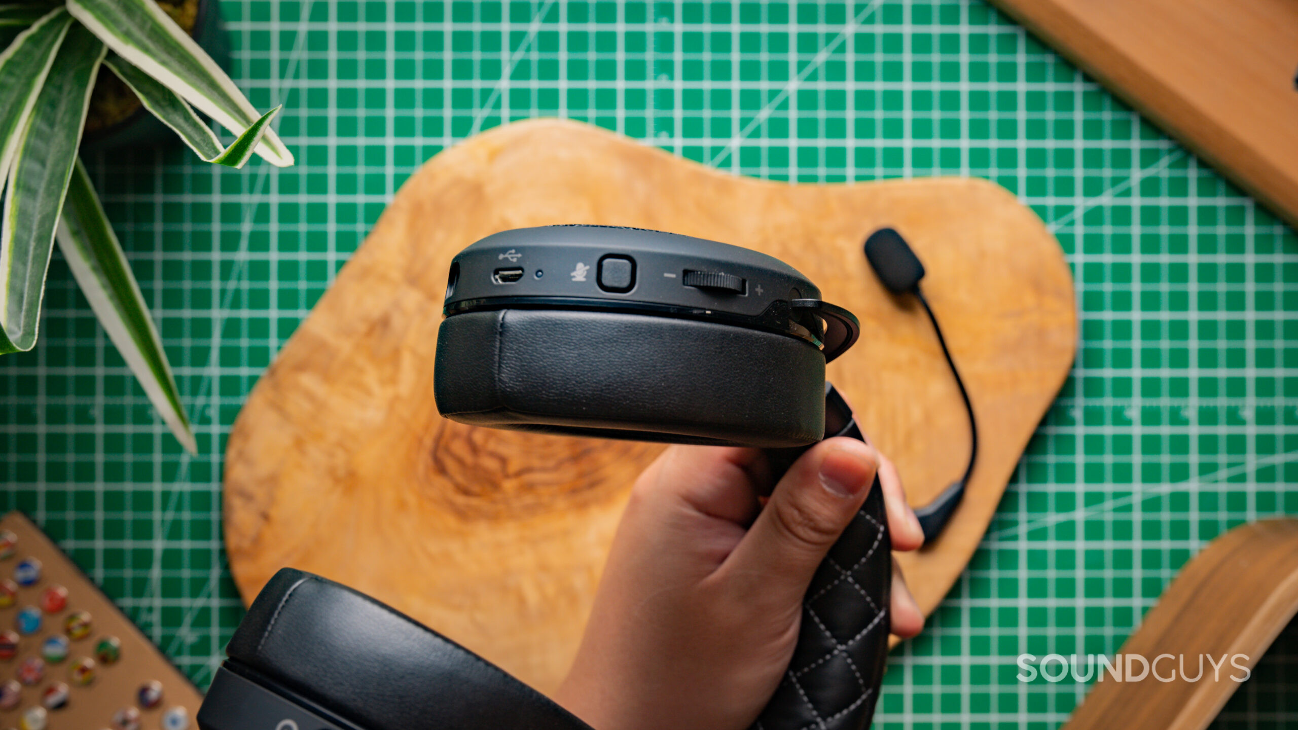 A view of the controls on the bottom of one of the ear cups on the Corsair HS70 Pro Wireless.