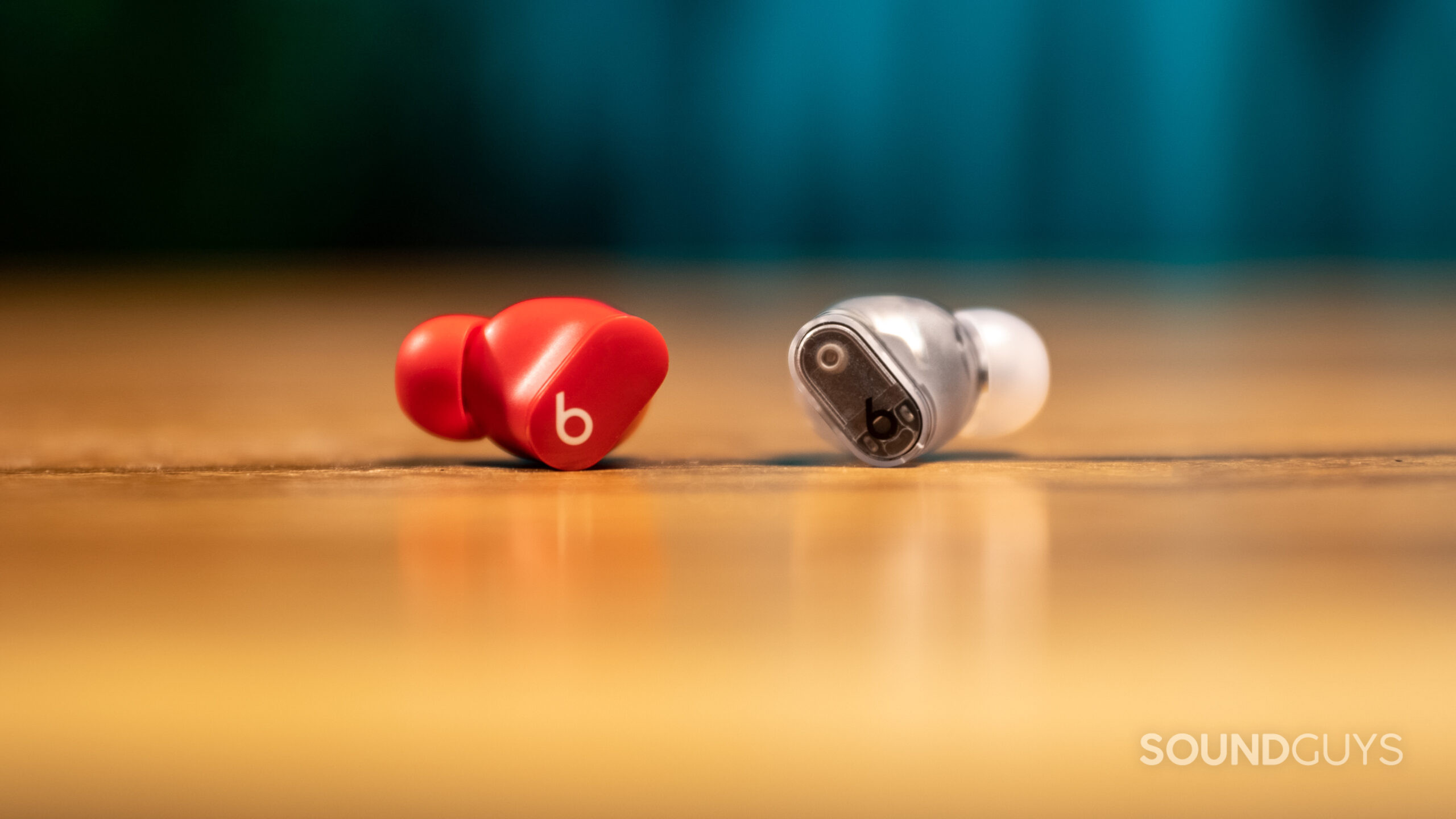 The Beats Studio Buds and Studio Buds Plus earbuds side by side for comparison.