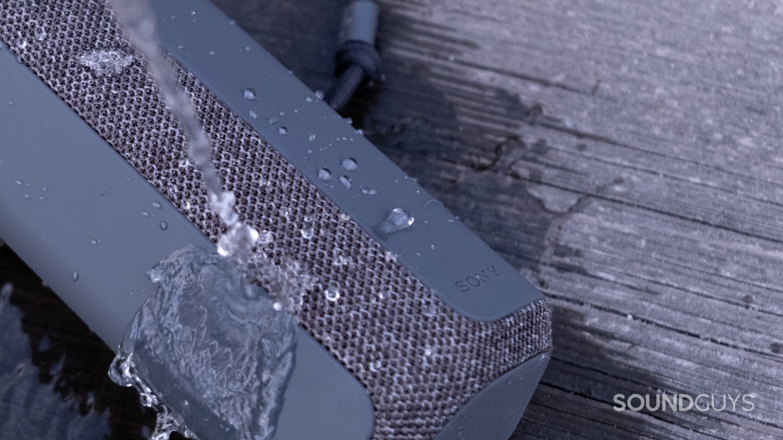 Water pours onto the Sony SRS-XE200 speaker.