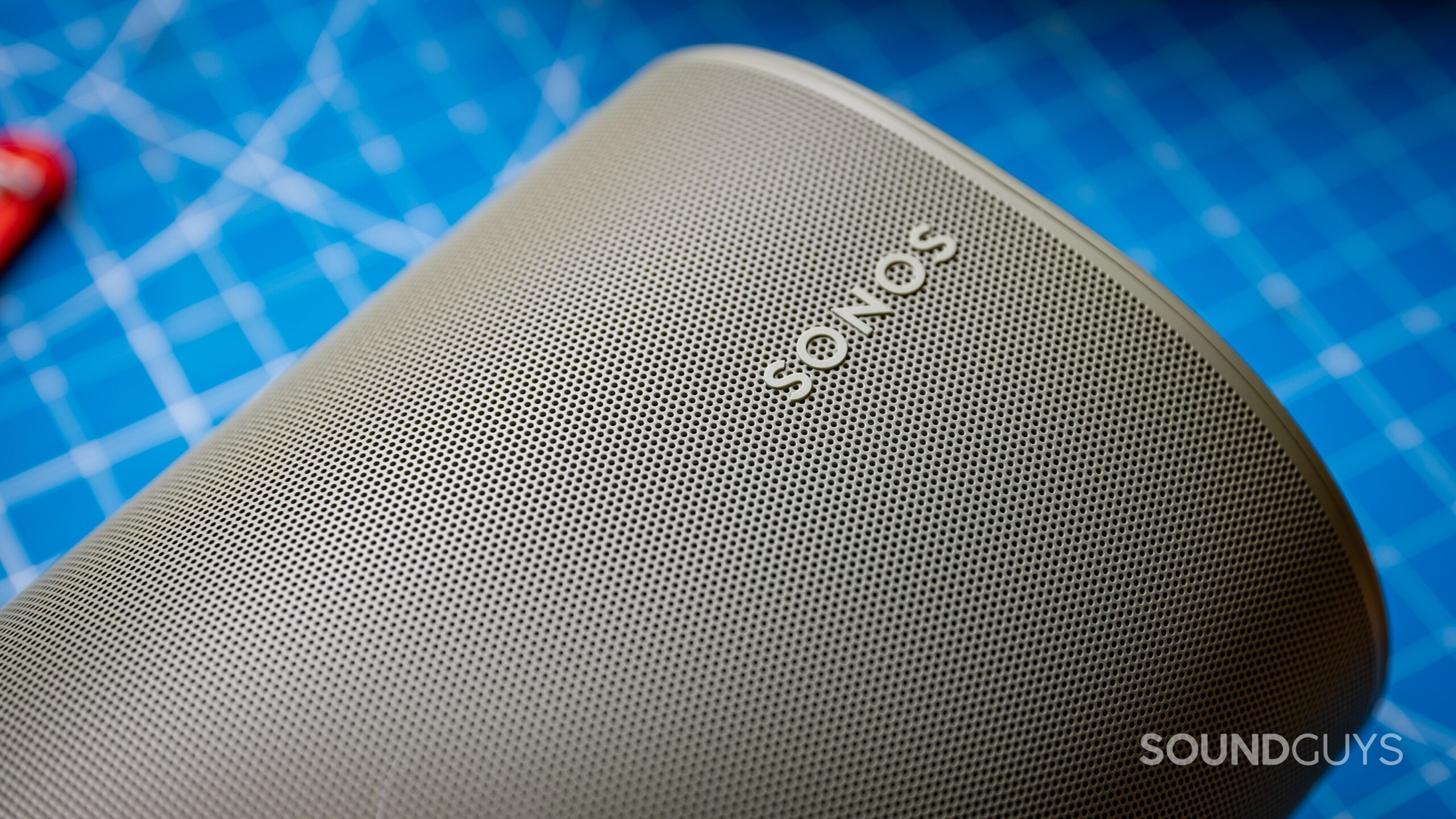 A close up of the Sonos Move 2 shows the logo and grill.