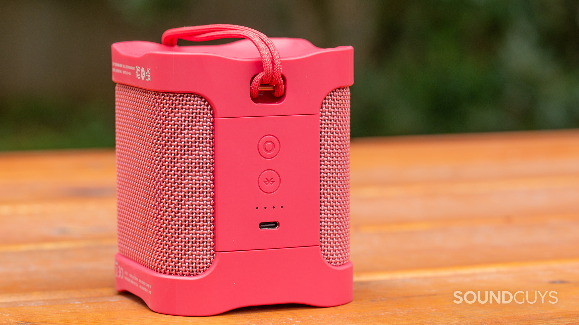 The Skullcandy Terrain Mini XT sits atop a picnic table.