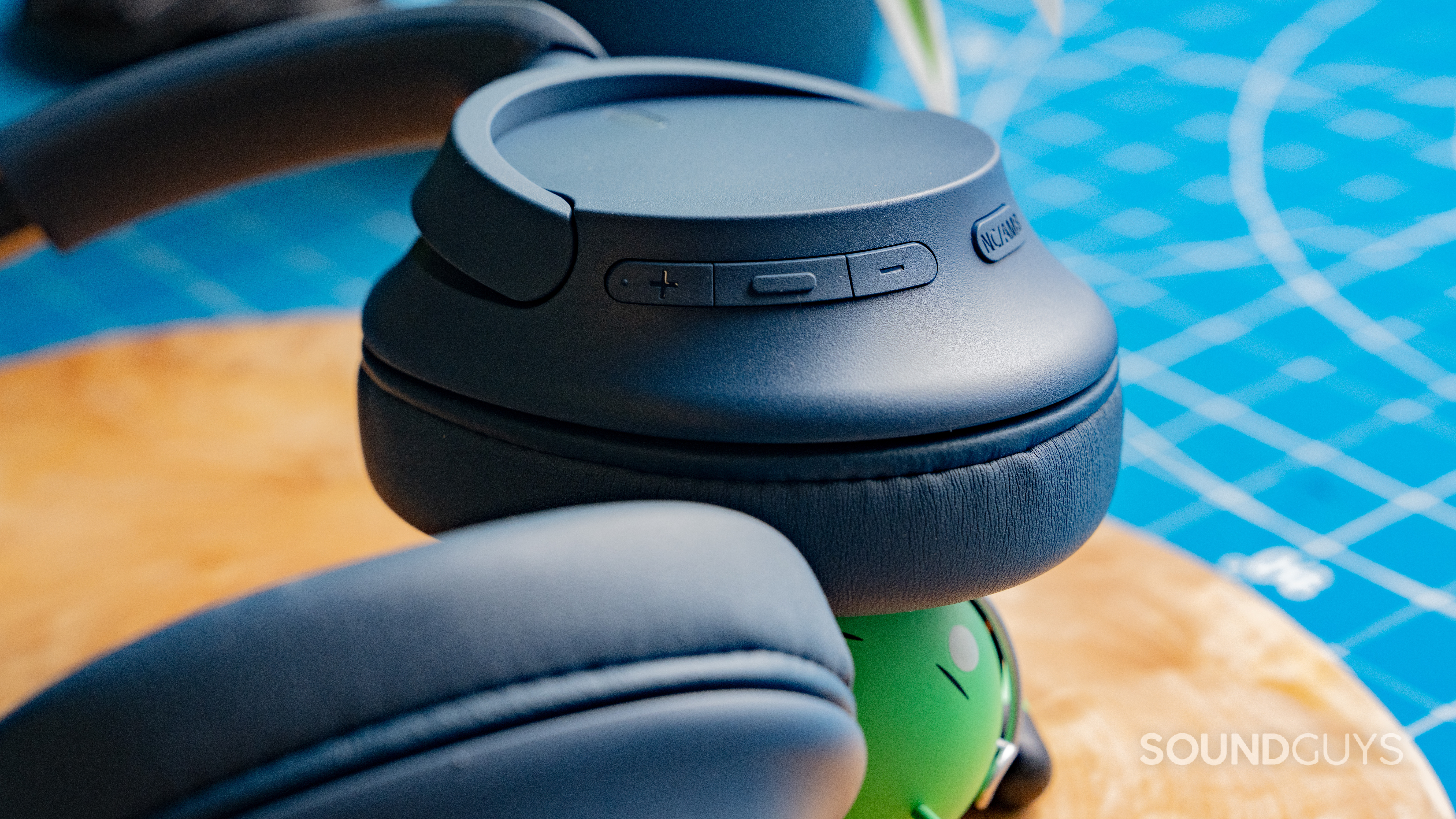 A close up of the Sony WH-CH720N showing the buttons on the ear cups.