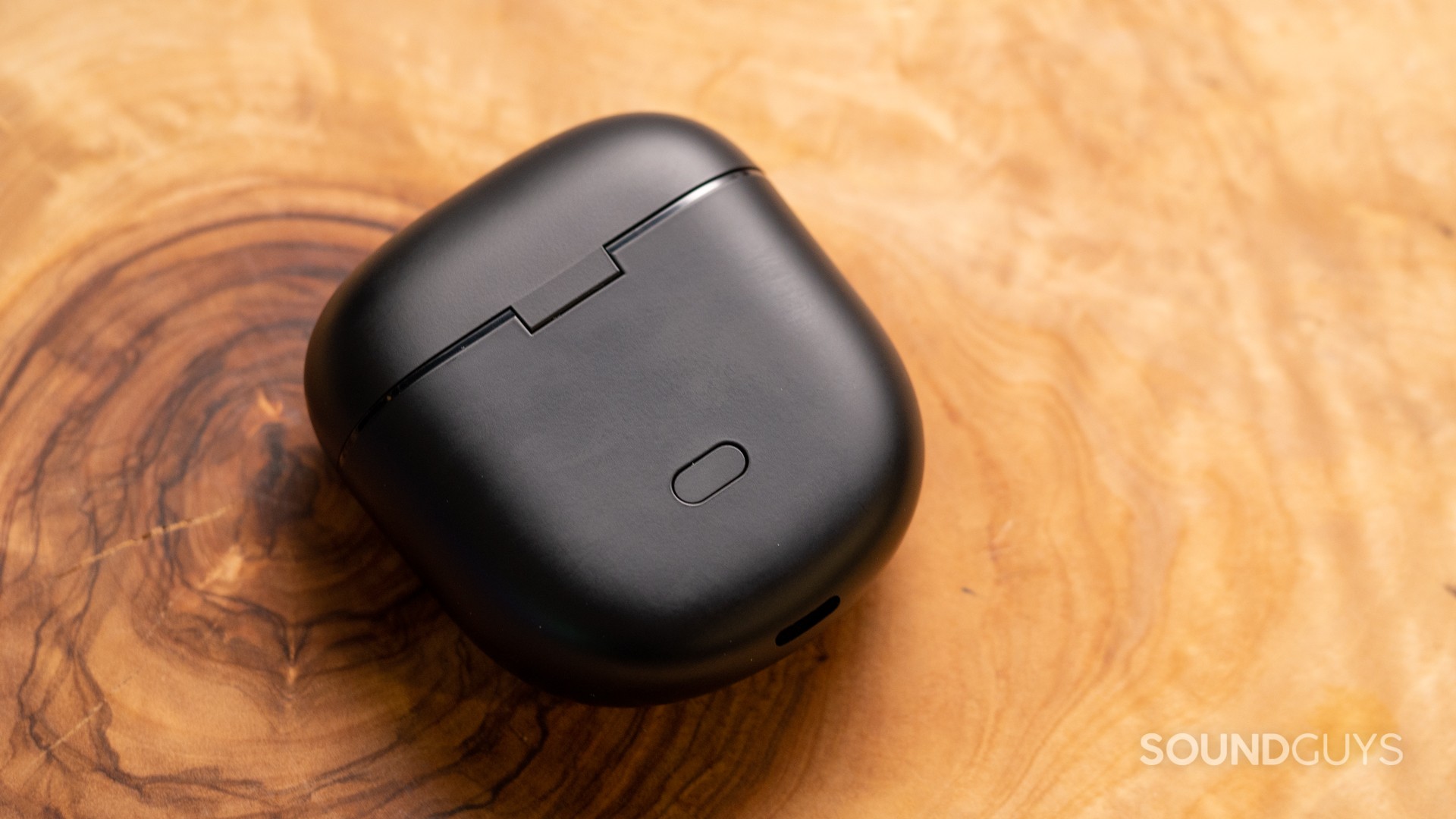 The Bose QuietComfort Ultra Earbuds' pairing button is located at the back of the charging case.