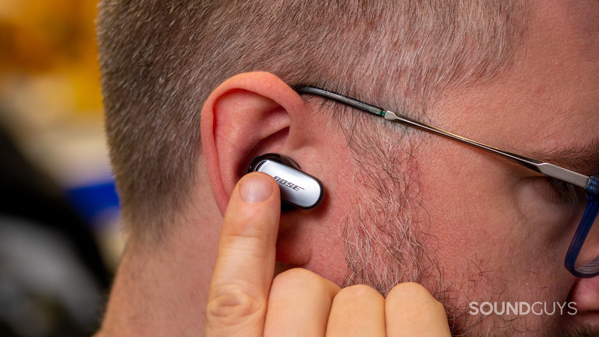 The capacitive touchpads of the Bose QuietComfort Earbuds are the main control interface.