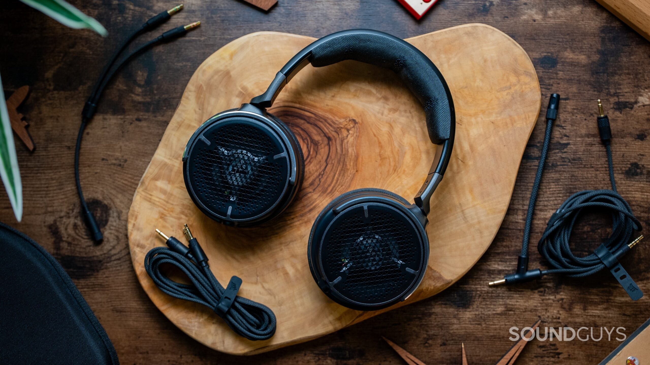 The Corsair VIRTUOSO PRO headset next to its included cables.