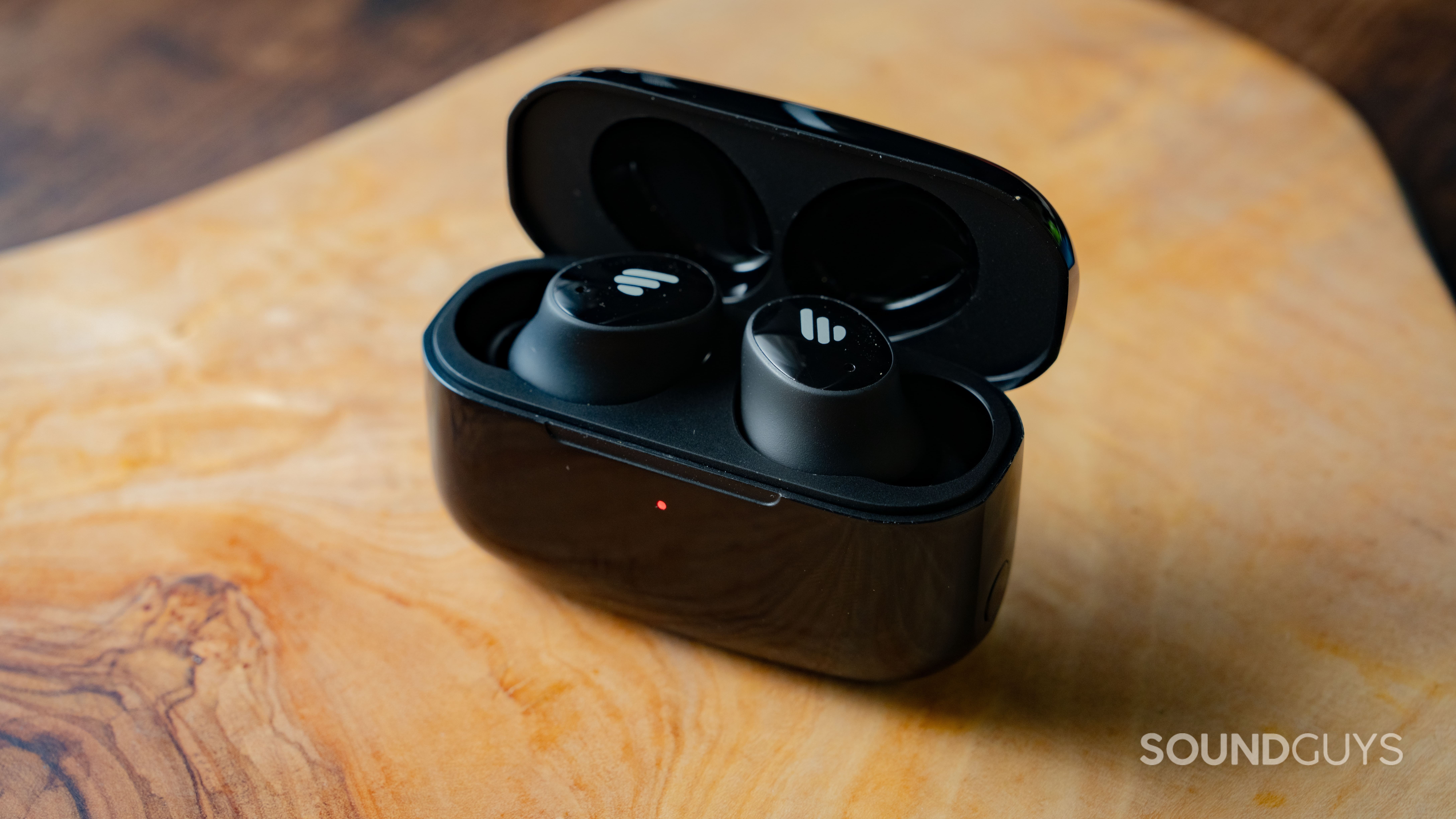 The Edifier TWS1 Pro 2 Earbuds in their charging case with the lid open.