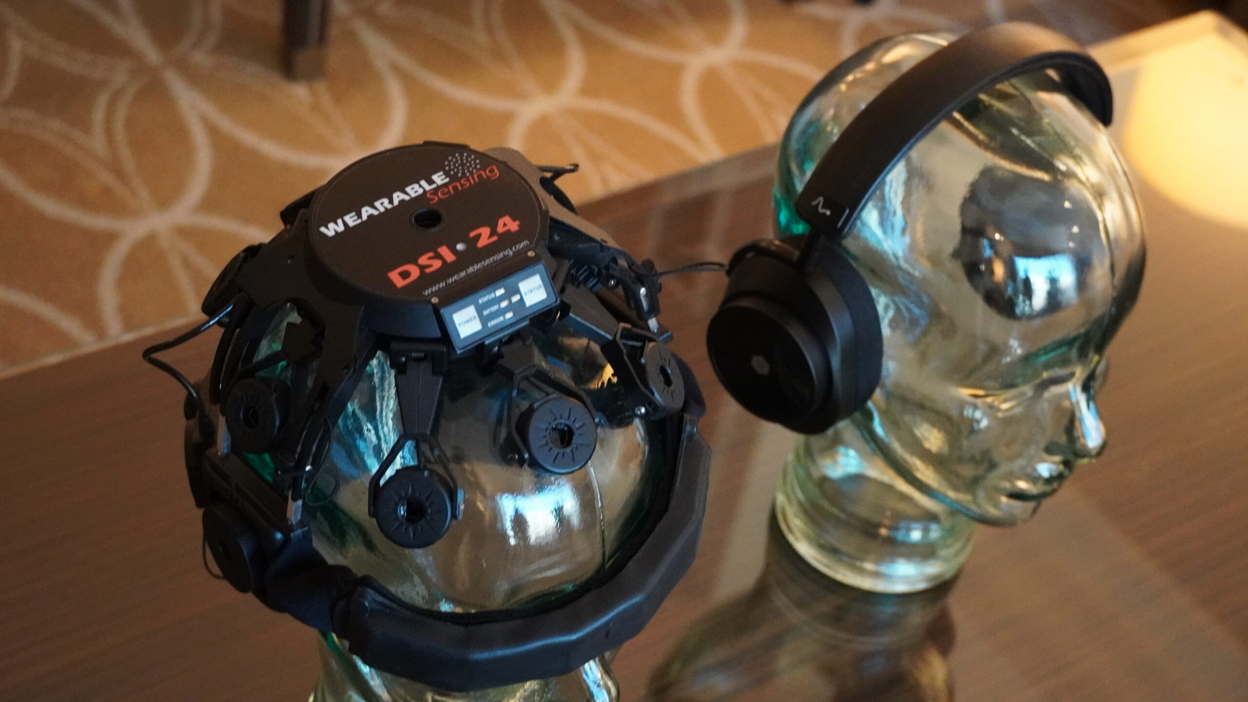 The DSI-24 Wearable Sensing headset compared to the MW75 Neuro headphones.