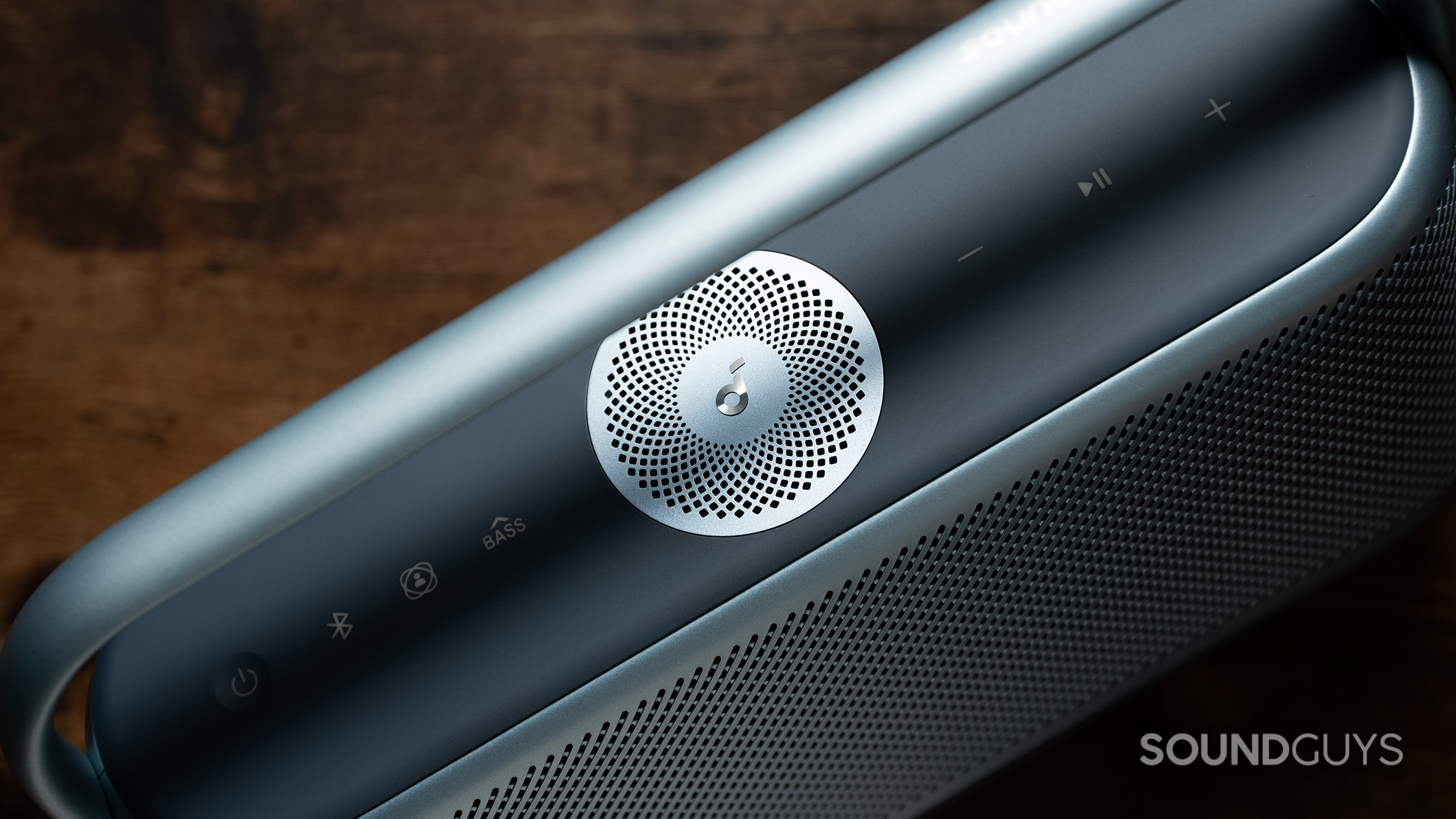 Top of the Anker Soundcore Motion X600 speaker with button controls and an upward firing driver. 