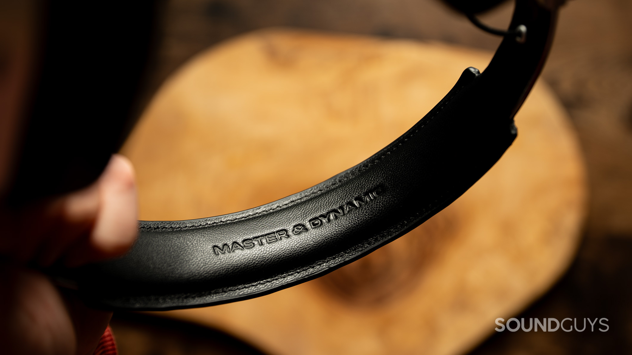 A closeup of the Master &amp; Dynamic headband showing the Master &amp; Dynamic logo. 