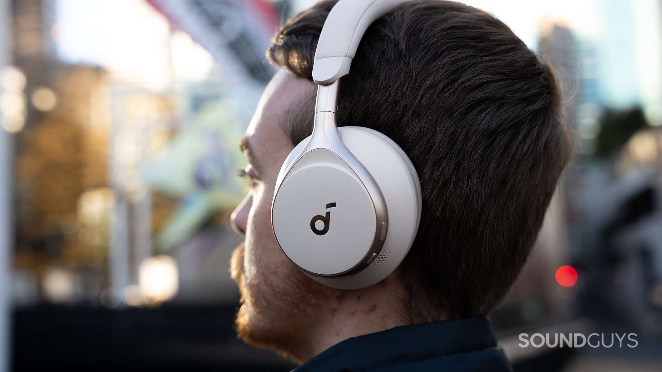 Anker Soundcore Space One headphones on a person looking out into the distance.