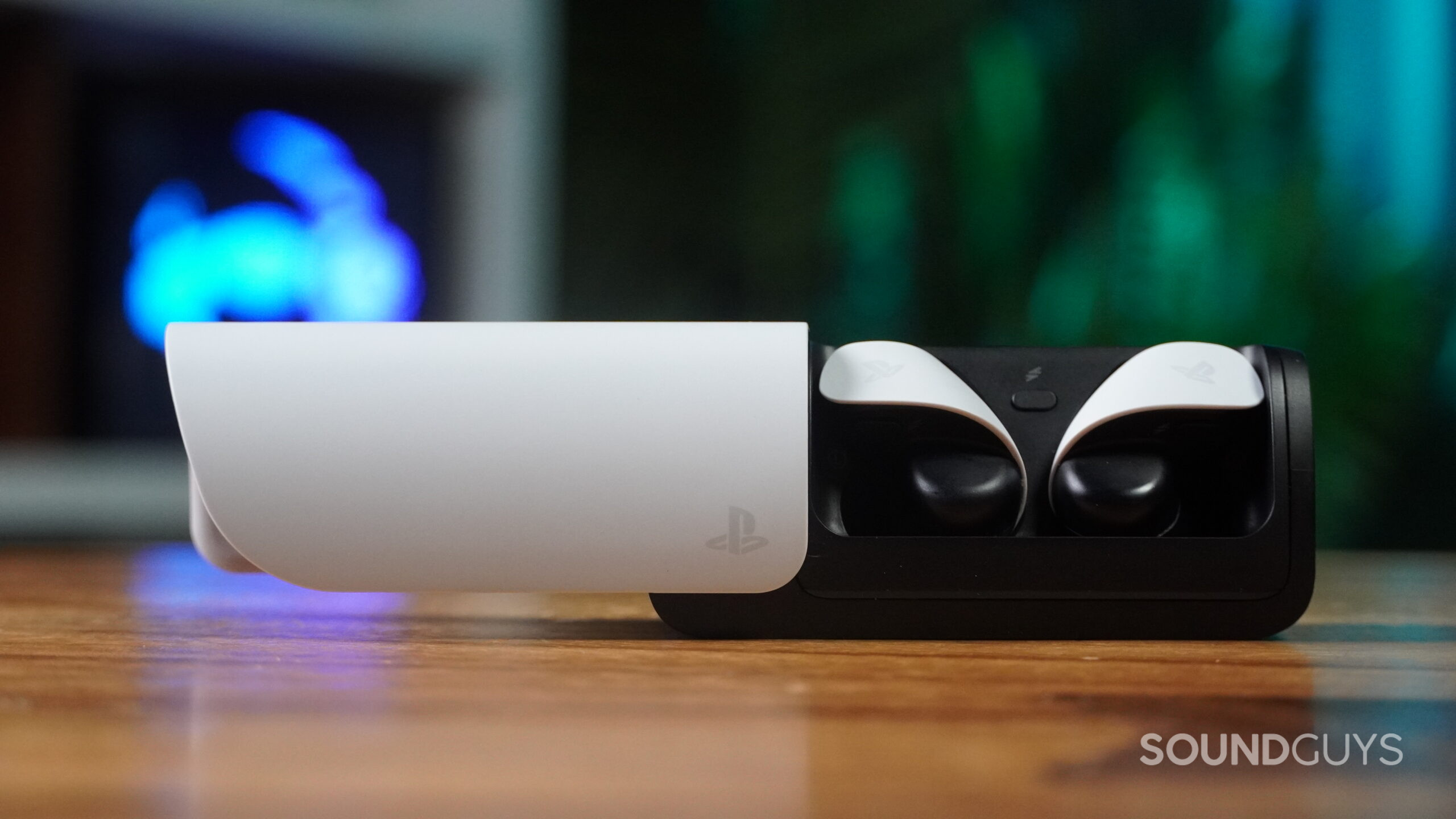Playstation pulse explore earbuds on table