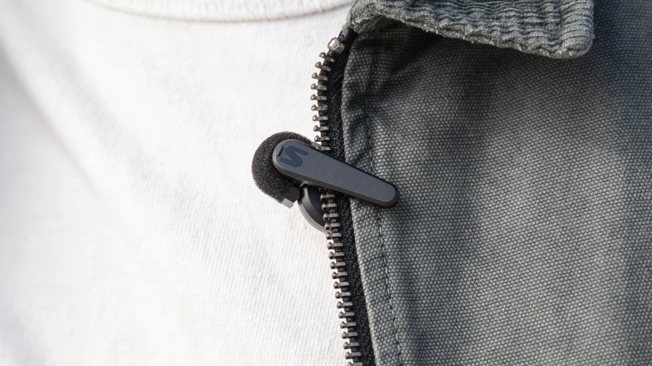 shure mocemic clipped onto a persons jacket