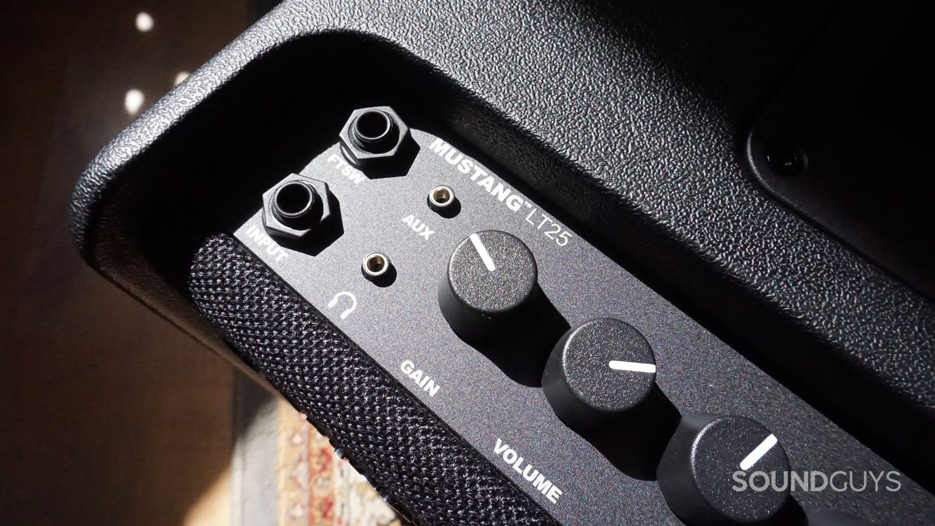 The Fender Mustang LT25 has an aux input so you can play along with your favorite songs